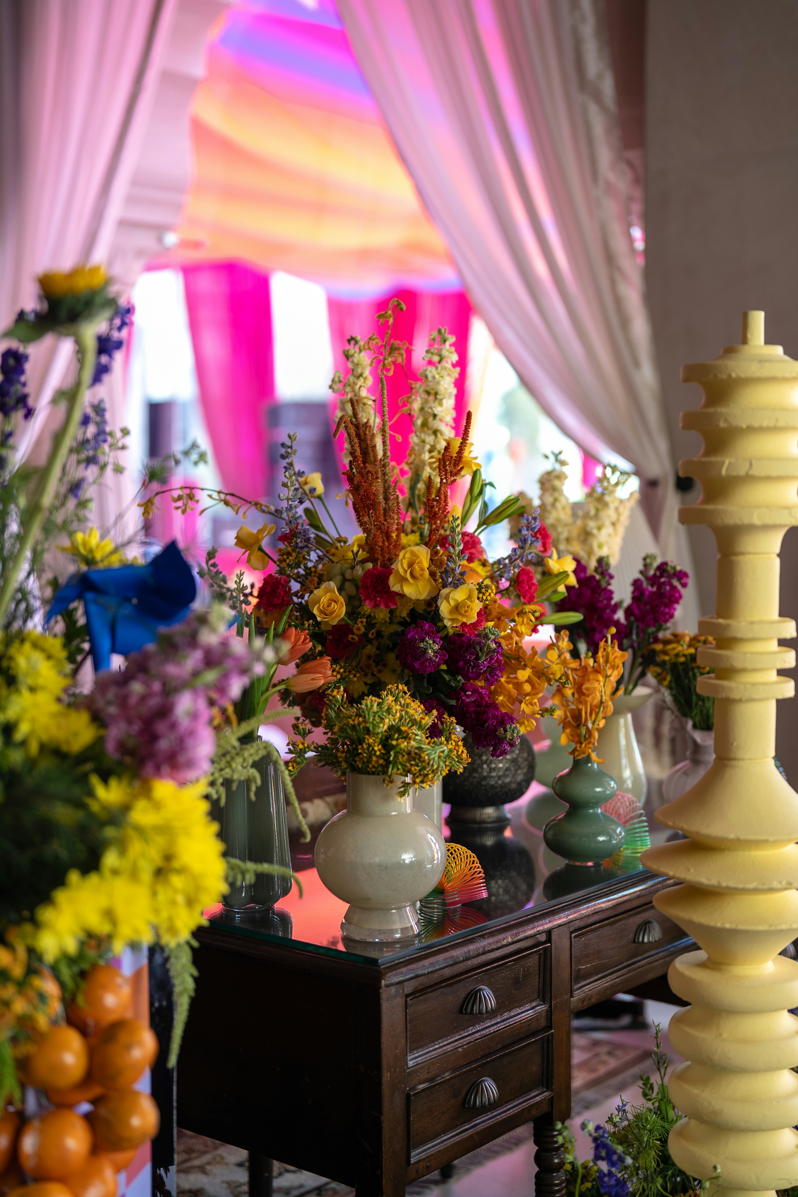 A birthday party setup with vibrant floral decorations