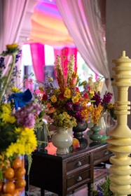 Bright floral arrangement adorns a decorative table.