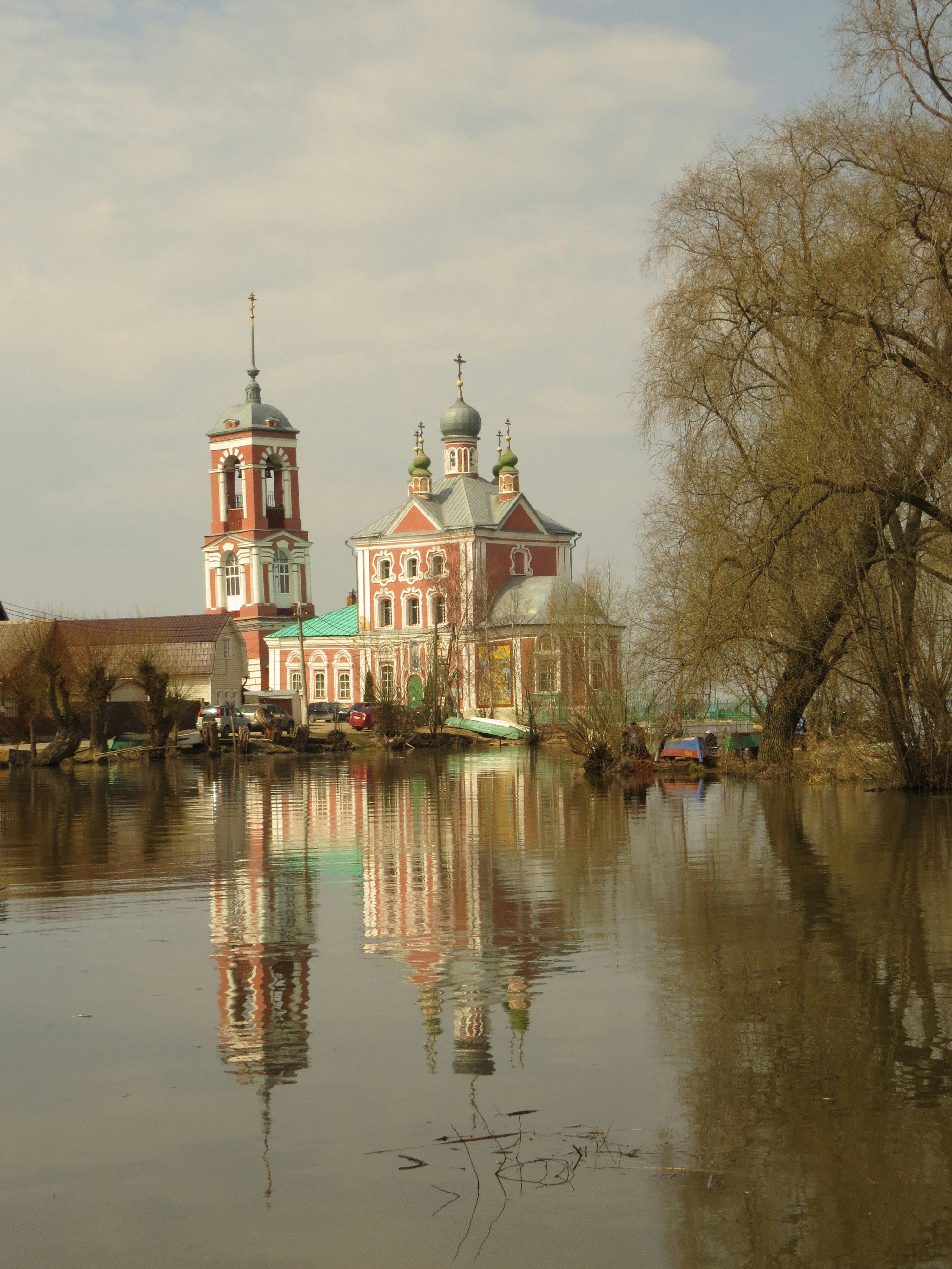 Church reflected in still water.