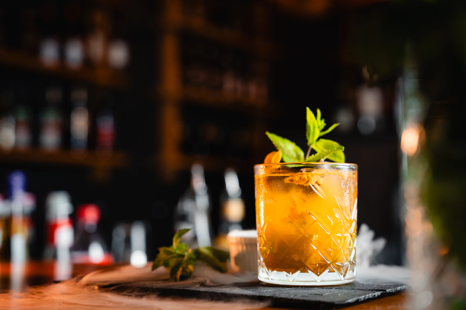 Refreshing herb-garnished drink with ice