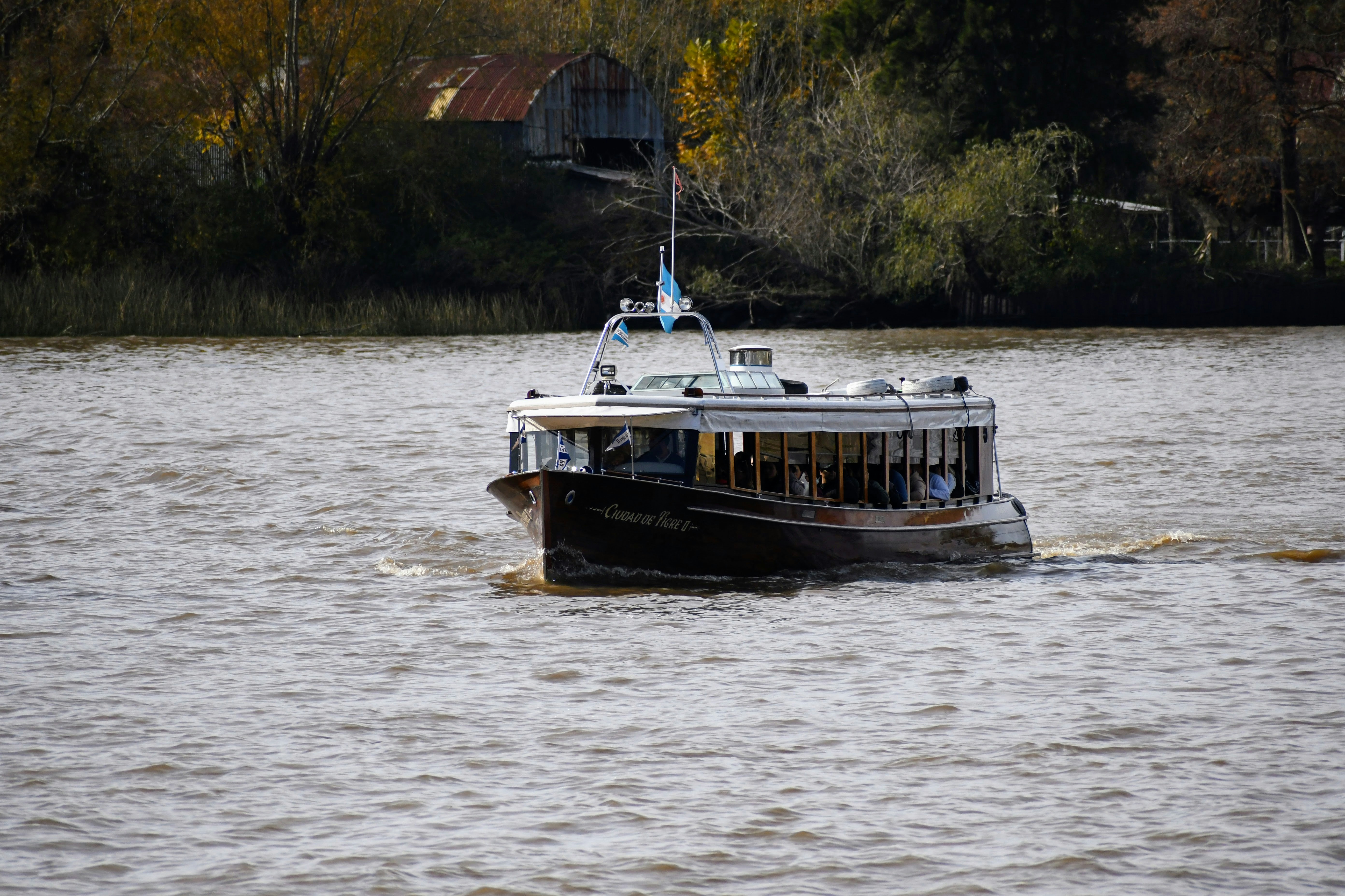 A boat on a river in Tigre, Argentina. Looks cool.