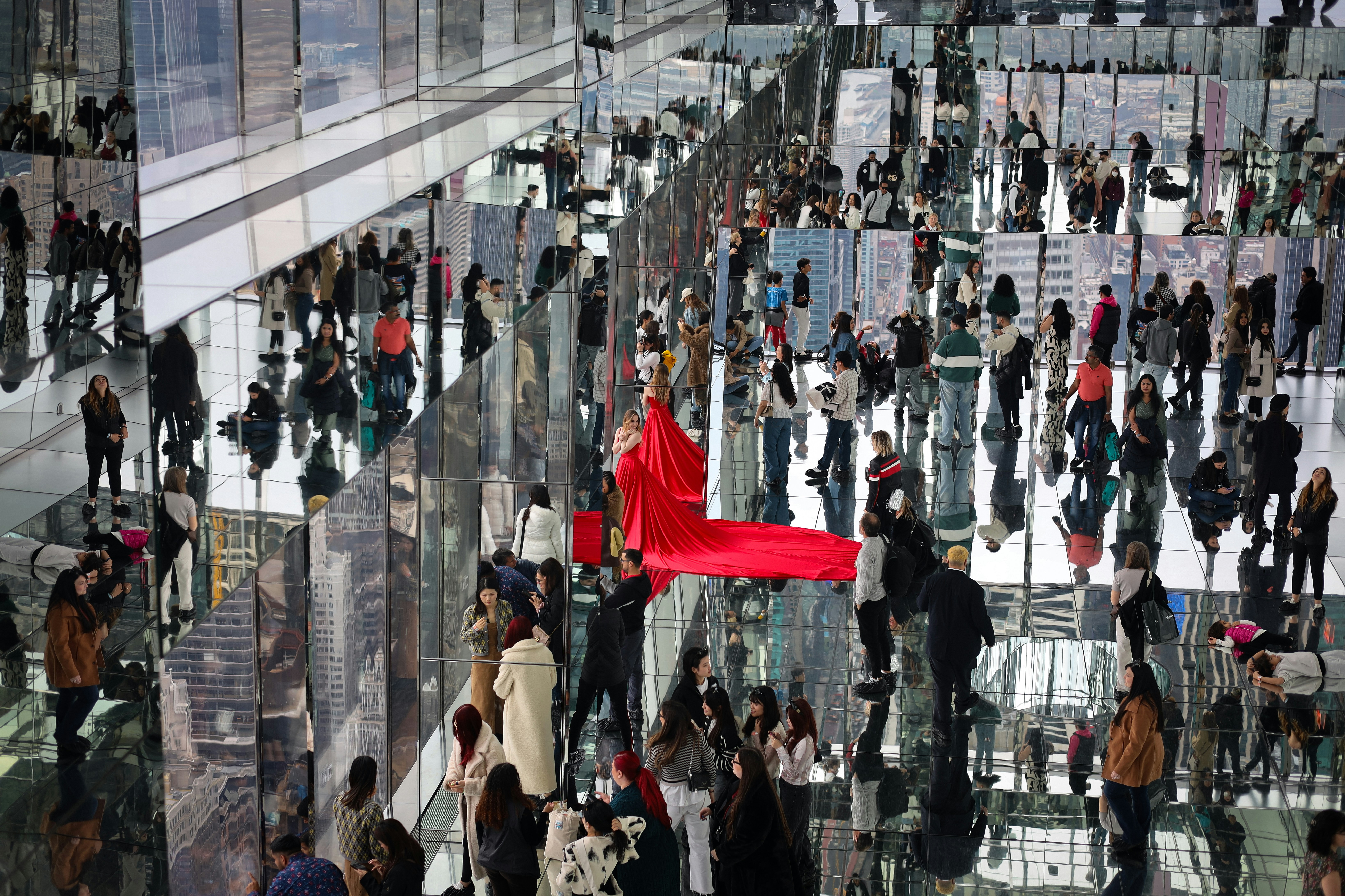 A fashion show is taking place with mirrors.