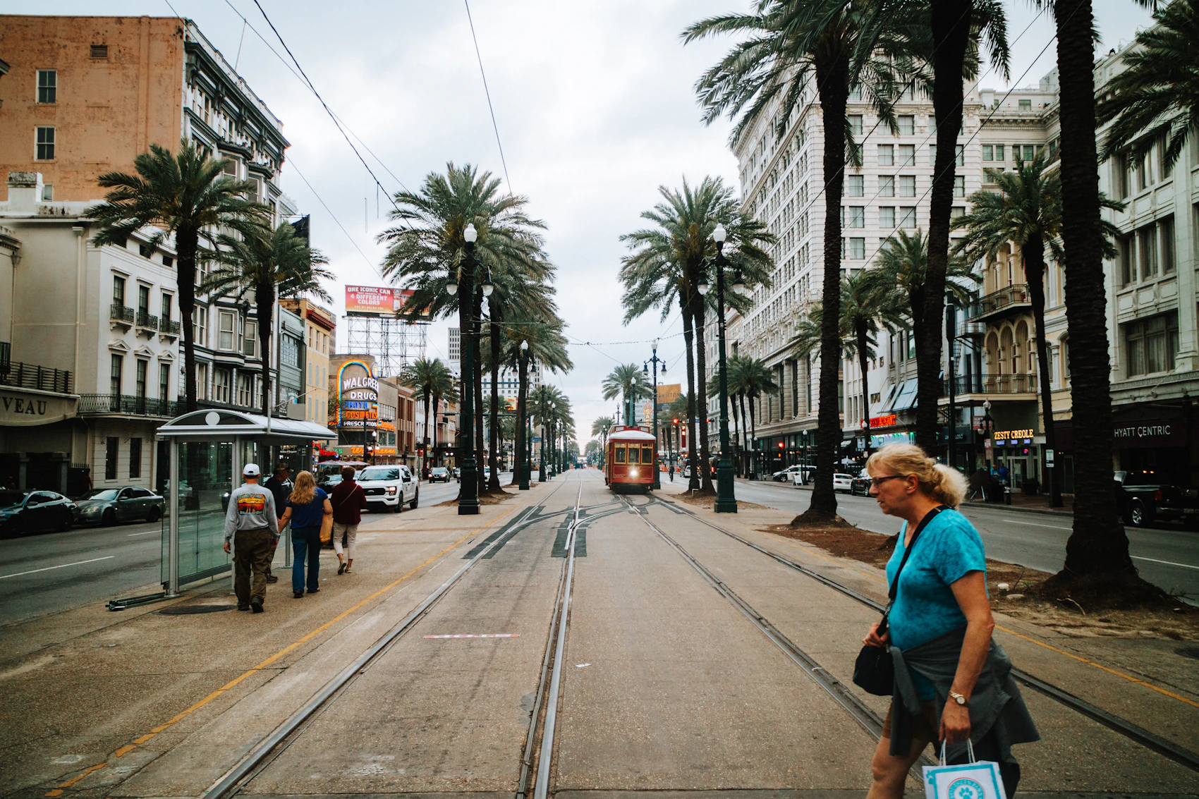 A streetcar travelling along Canal Street in New Orleans at sunset