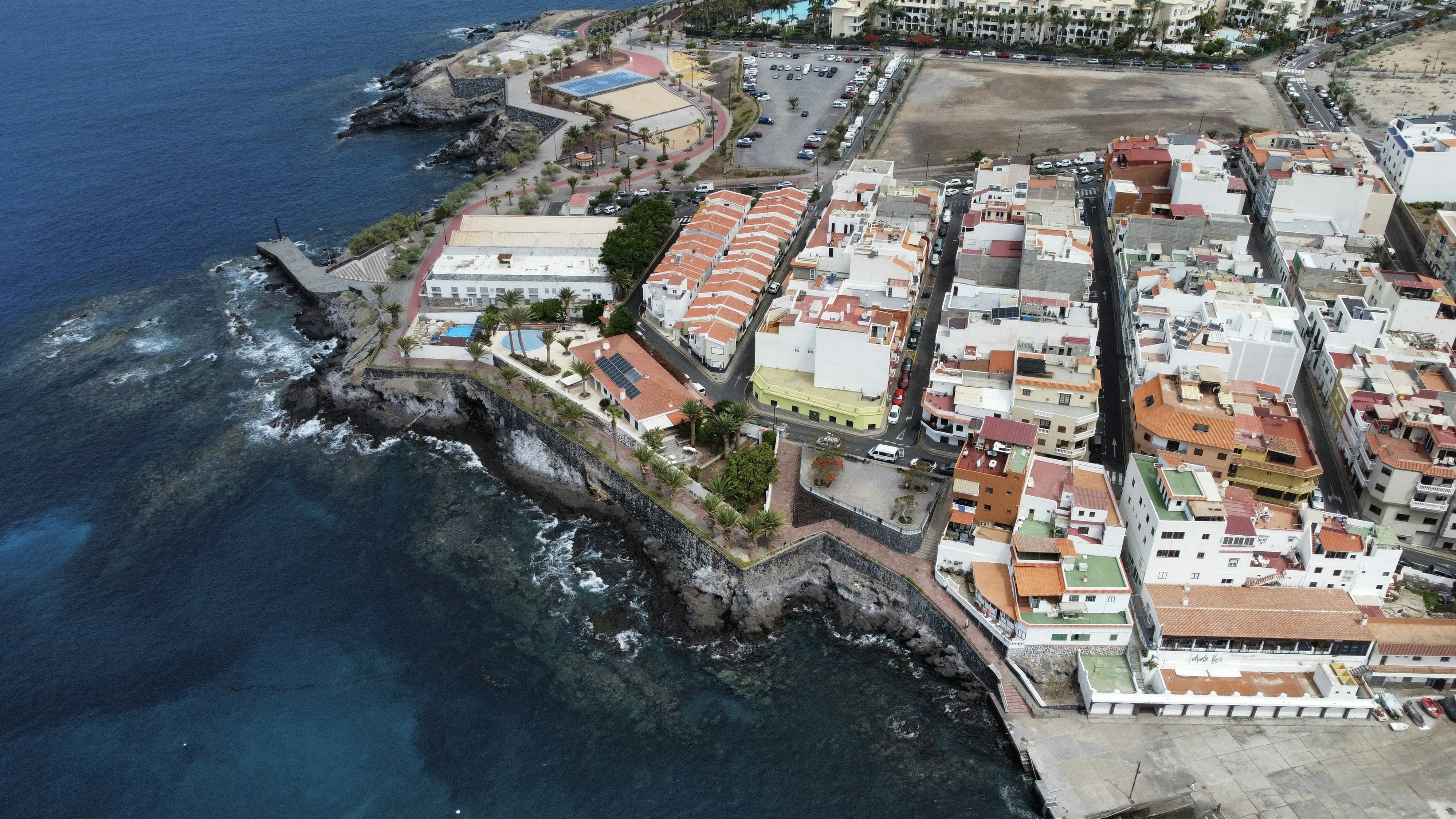 An aerial view of a coastal city.