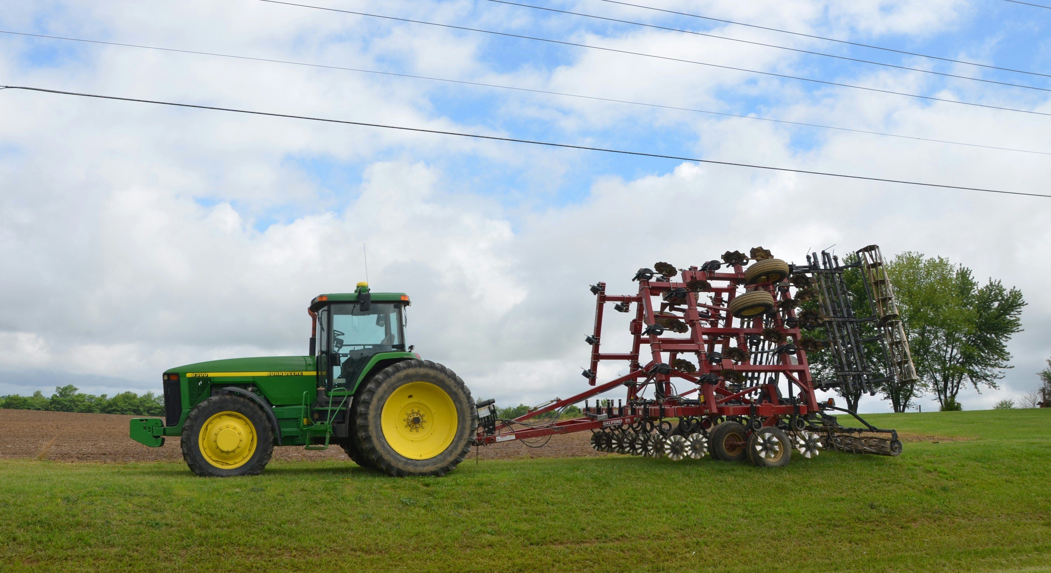 John Deere tractor with cultivator