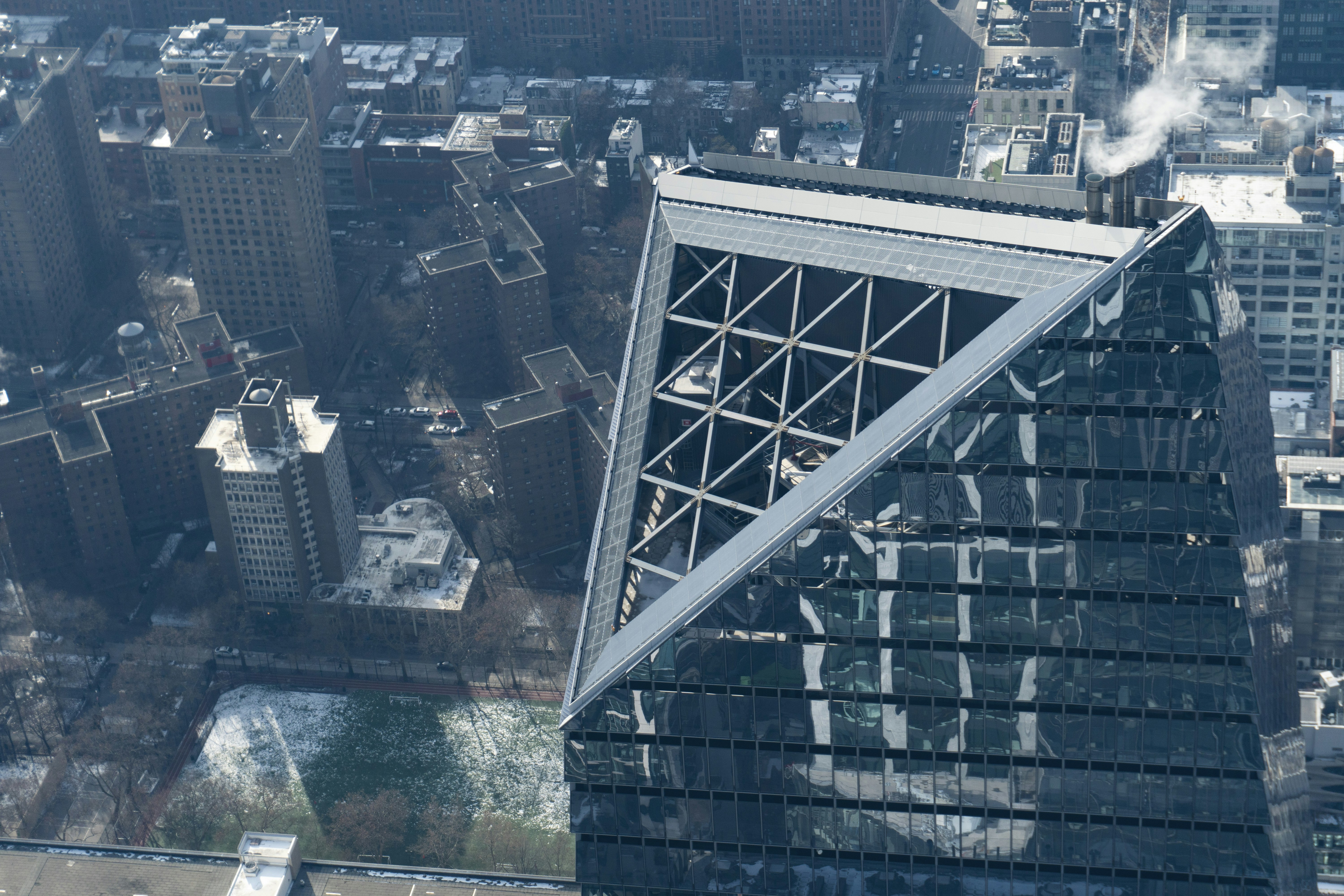 Modern high-rise building with an interesting triangular top. photo ...