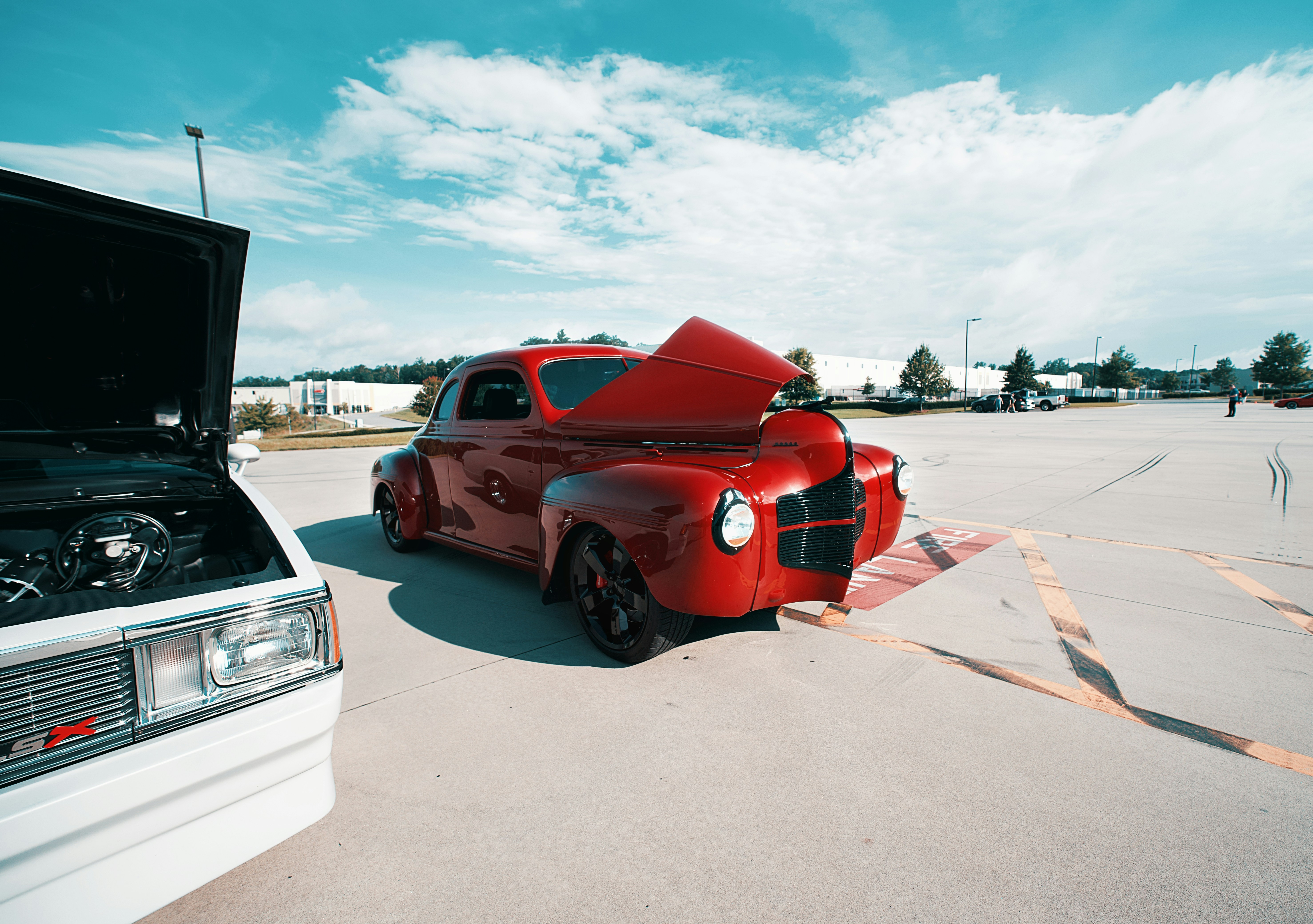 Modern electric pickup truck plugged into a fast-charging station