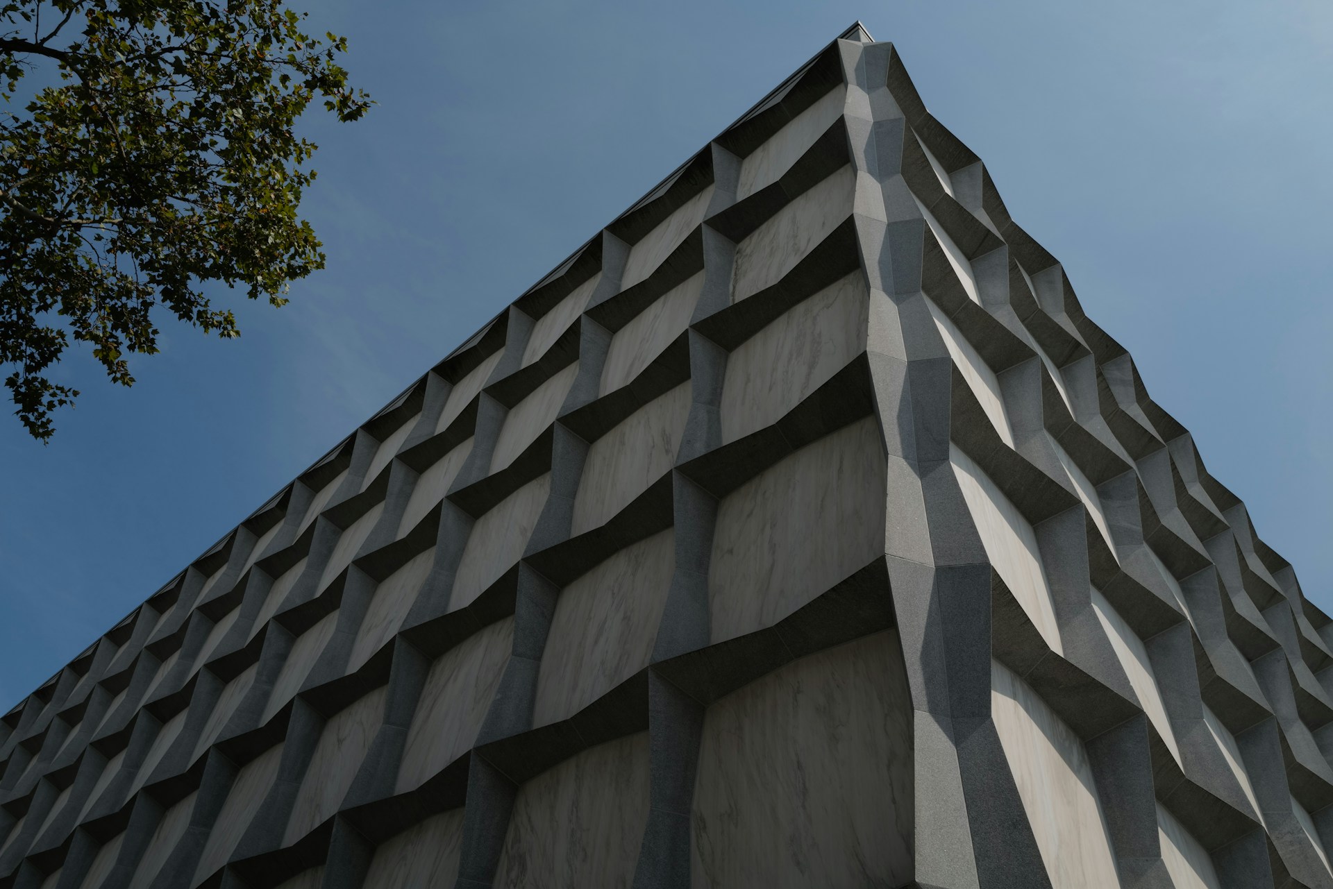 A modern building with a unique grid pattern.