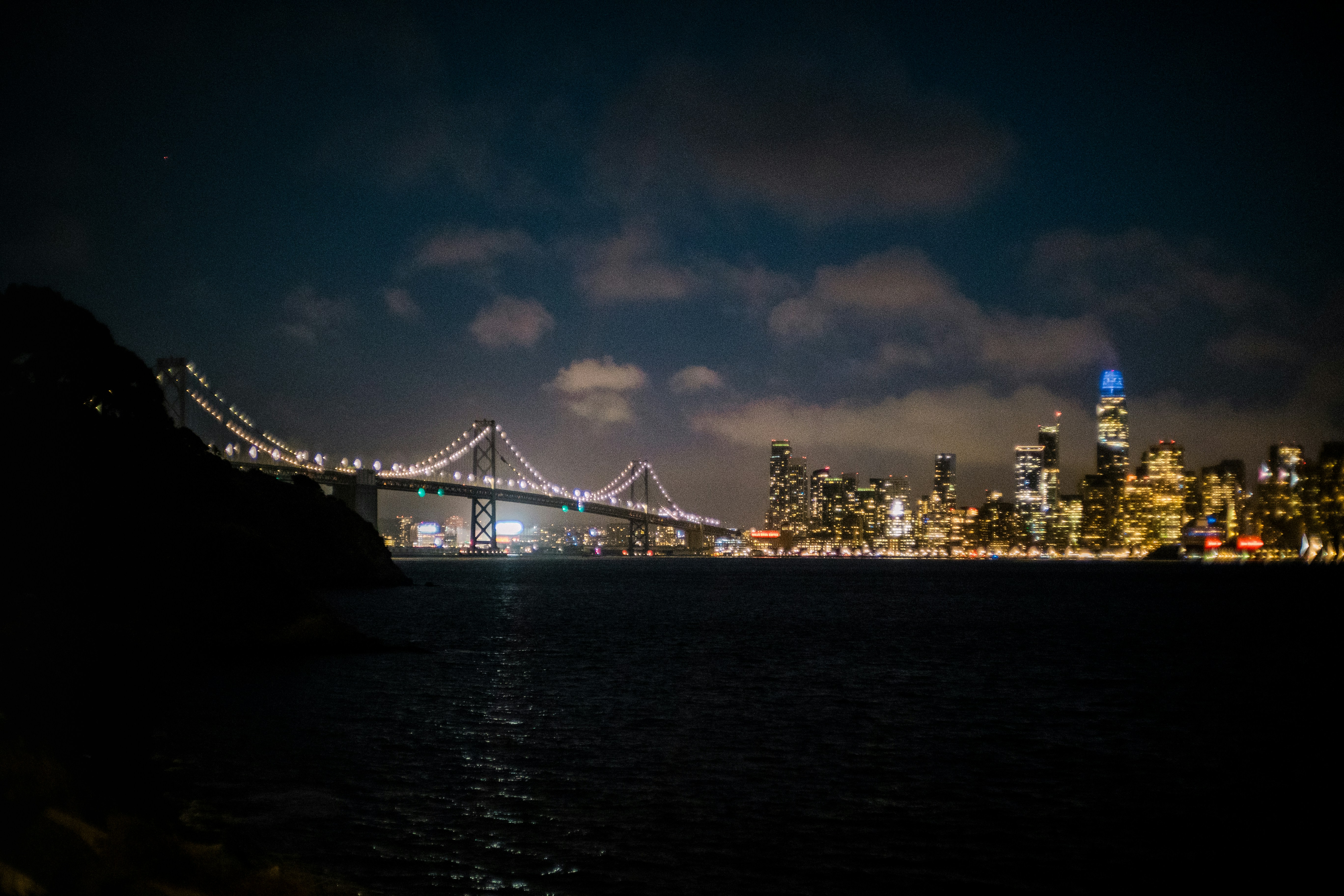 Night view of a city and its illuminated bridge. photo – Free Image on ...