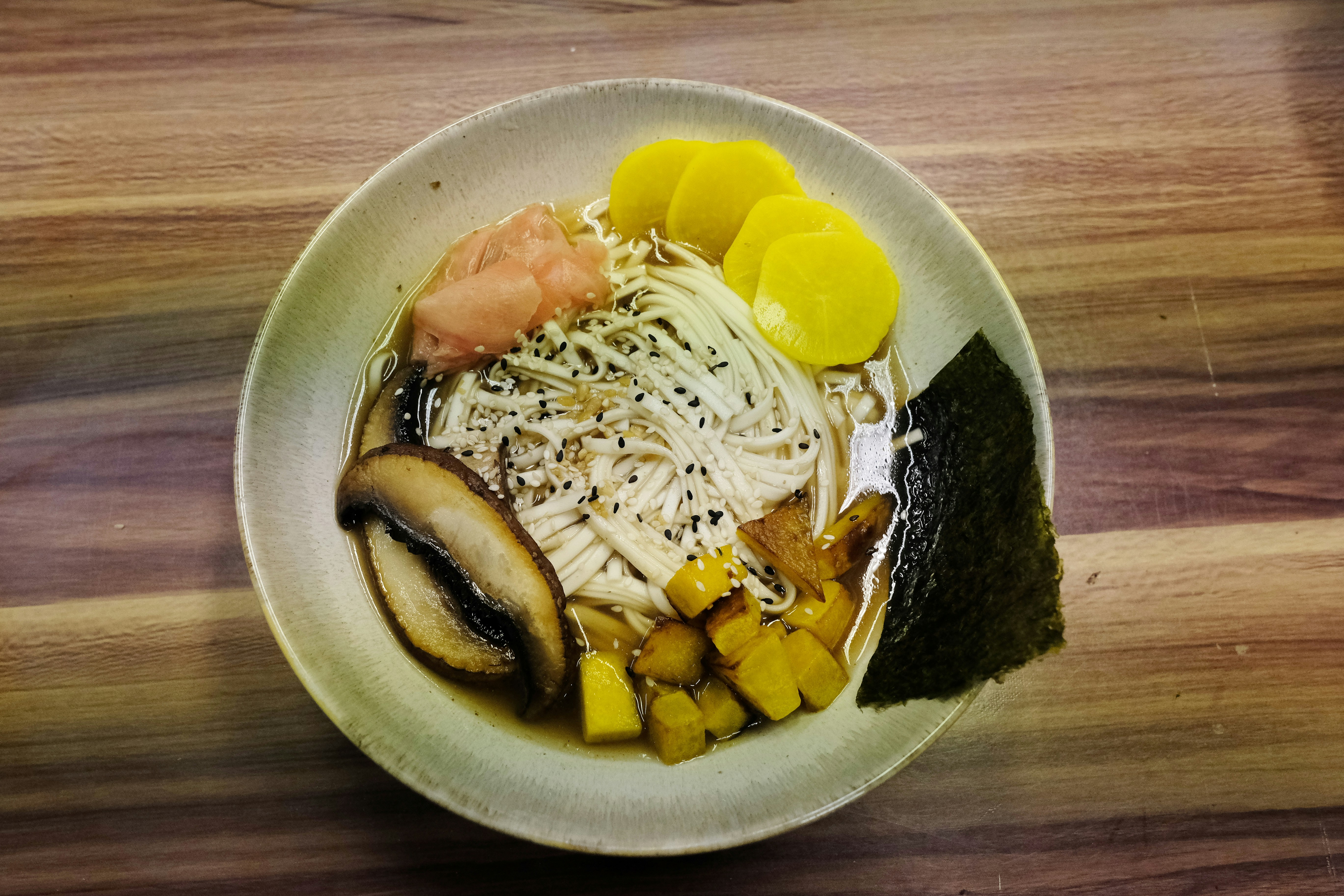 Ramen bowl with toppings, ready to enjoy.