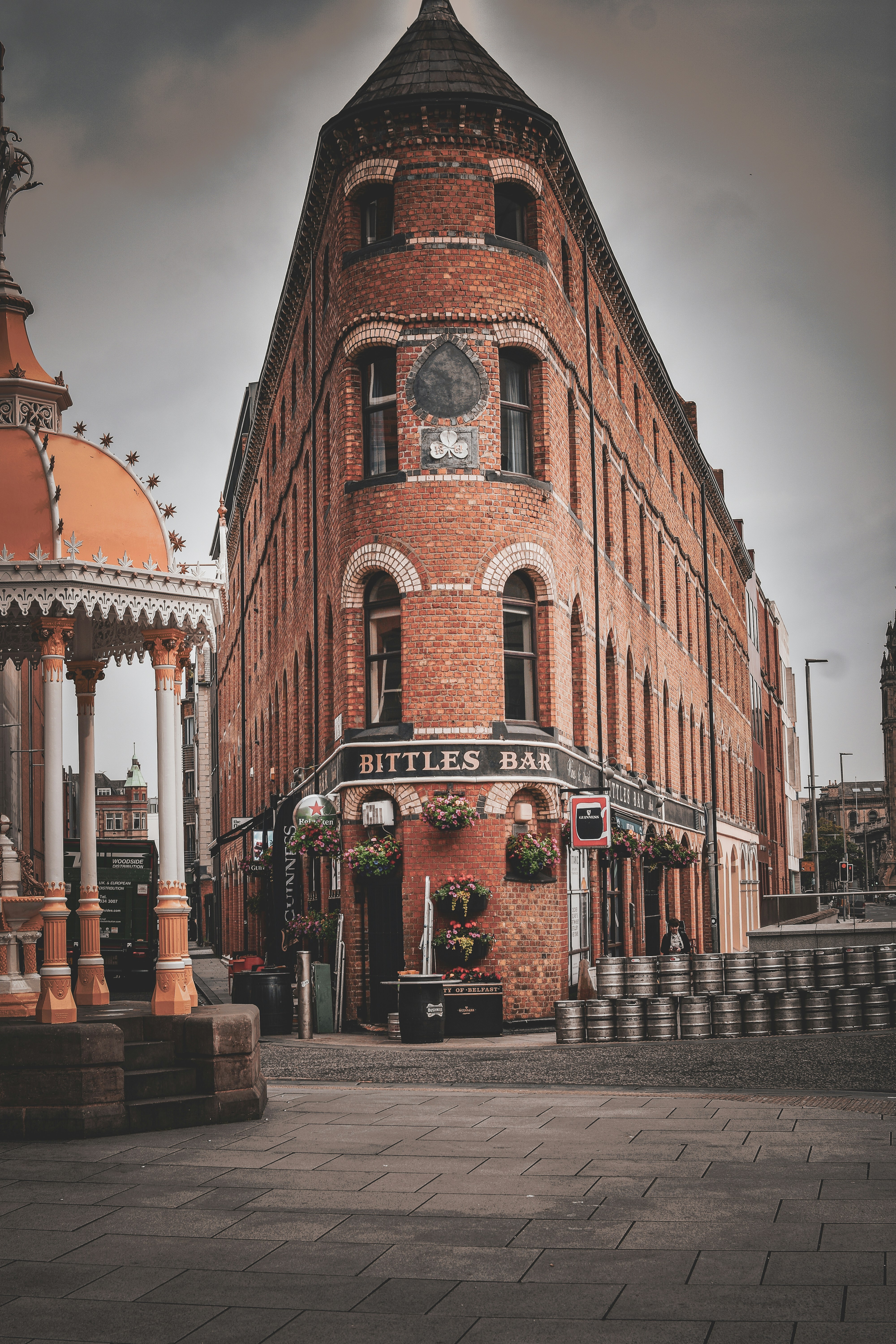 An old brick building with a bar is pictured.