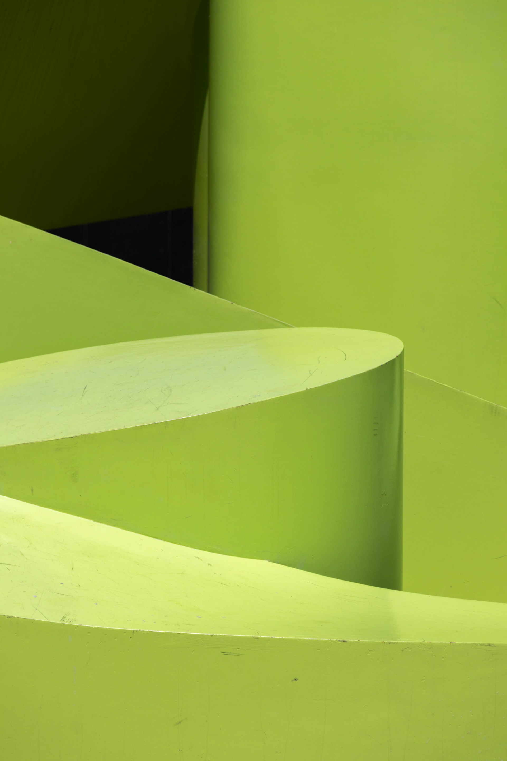 Abstract green shapes and curves.