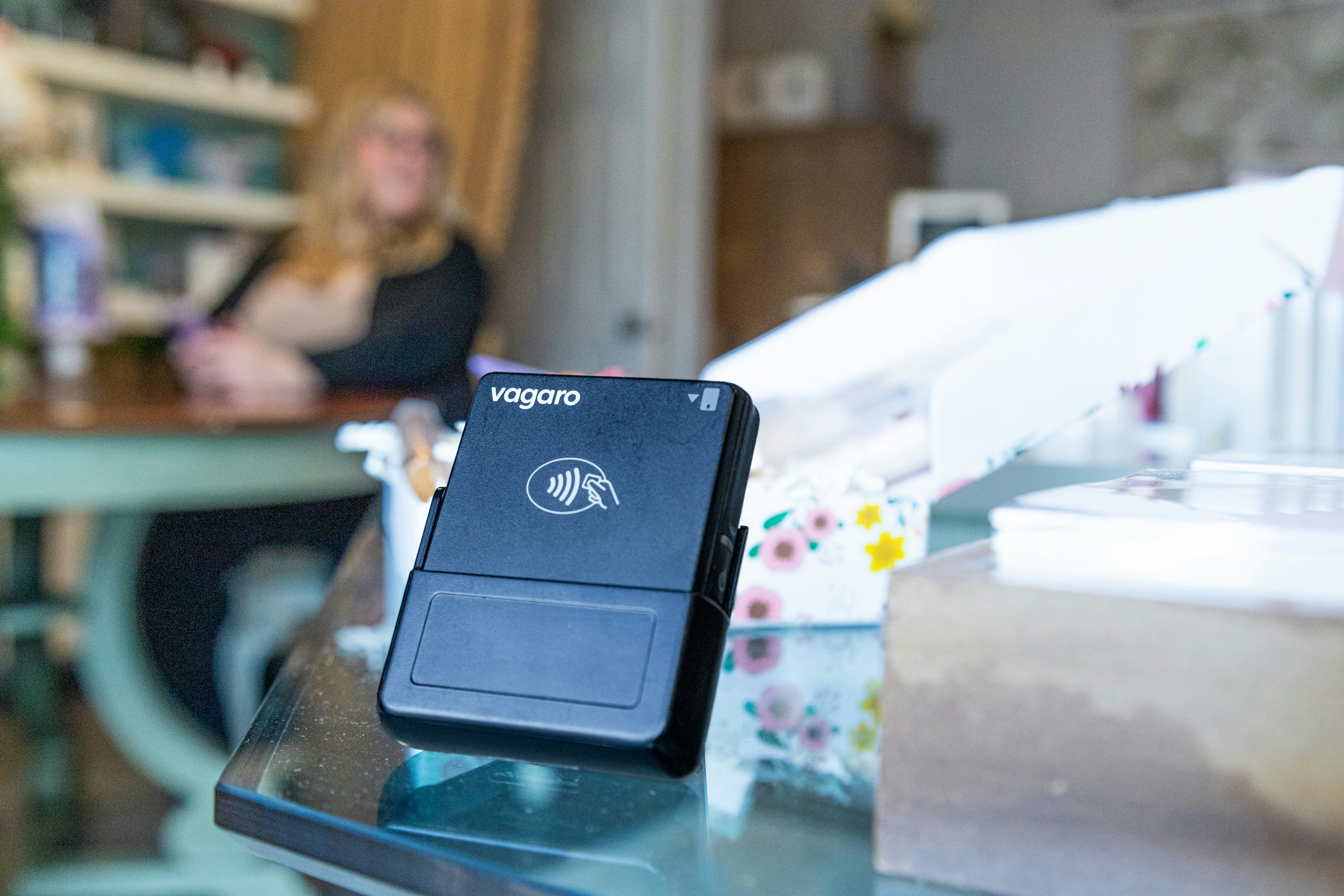 A card reader sits on a table.