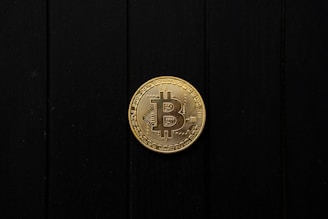 Bitcoin coin isolated on a black background.