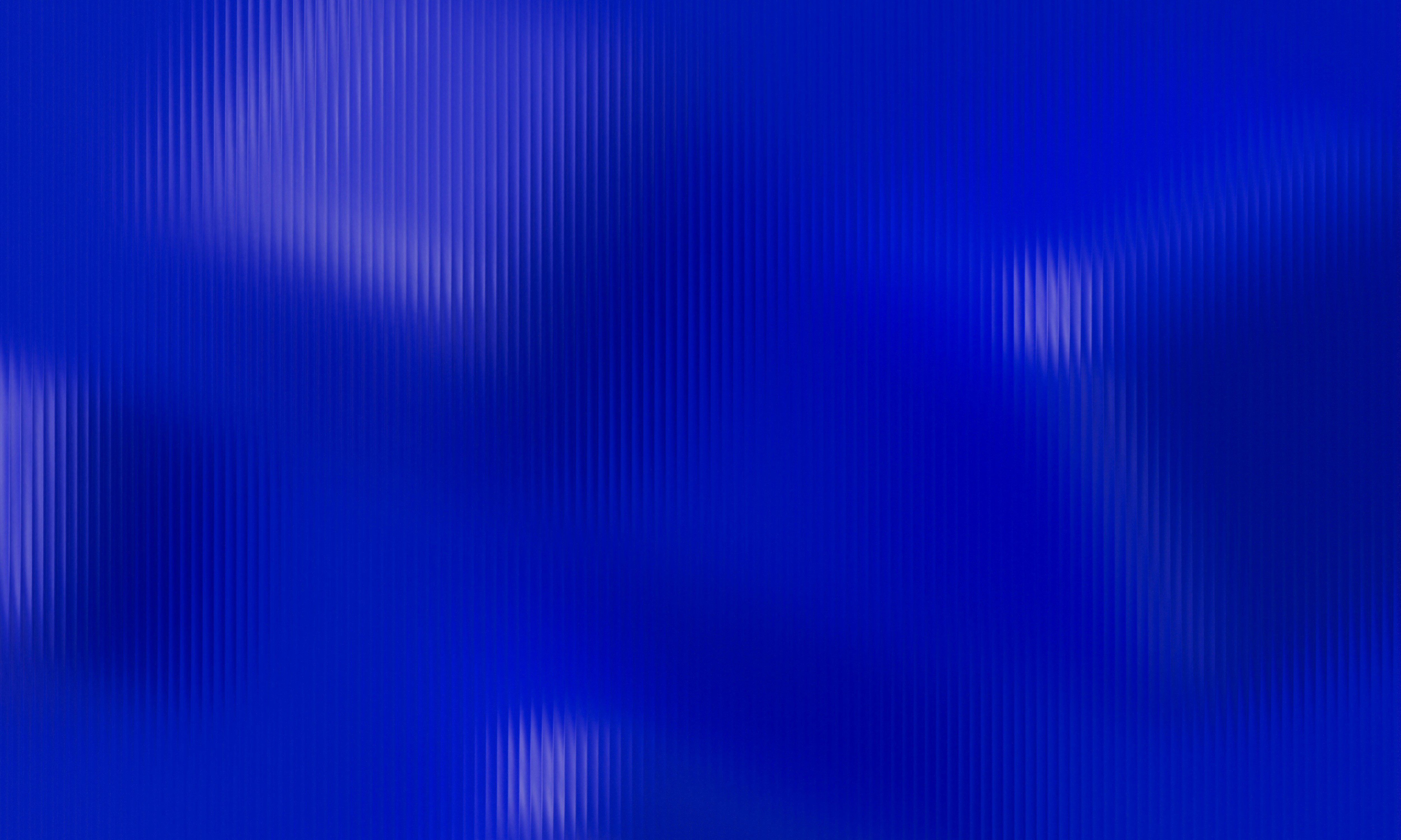 A blue and blurry patterned background.