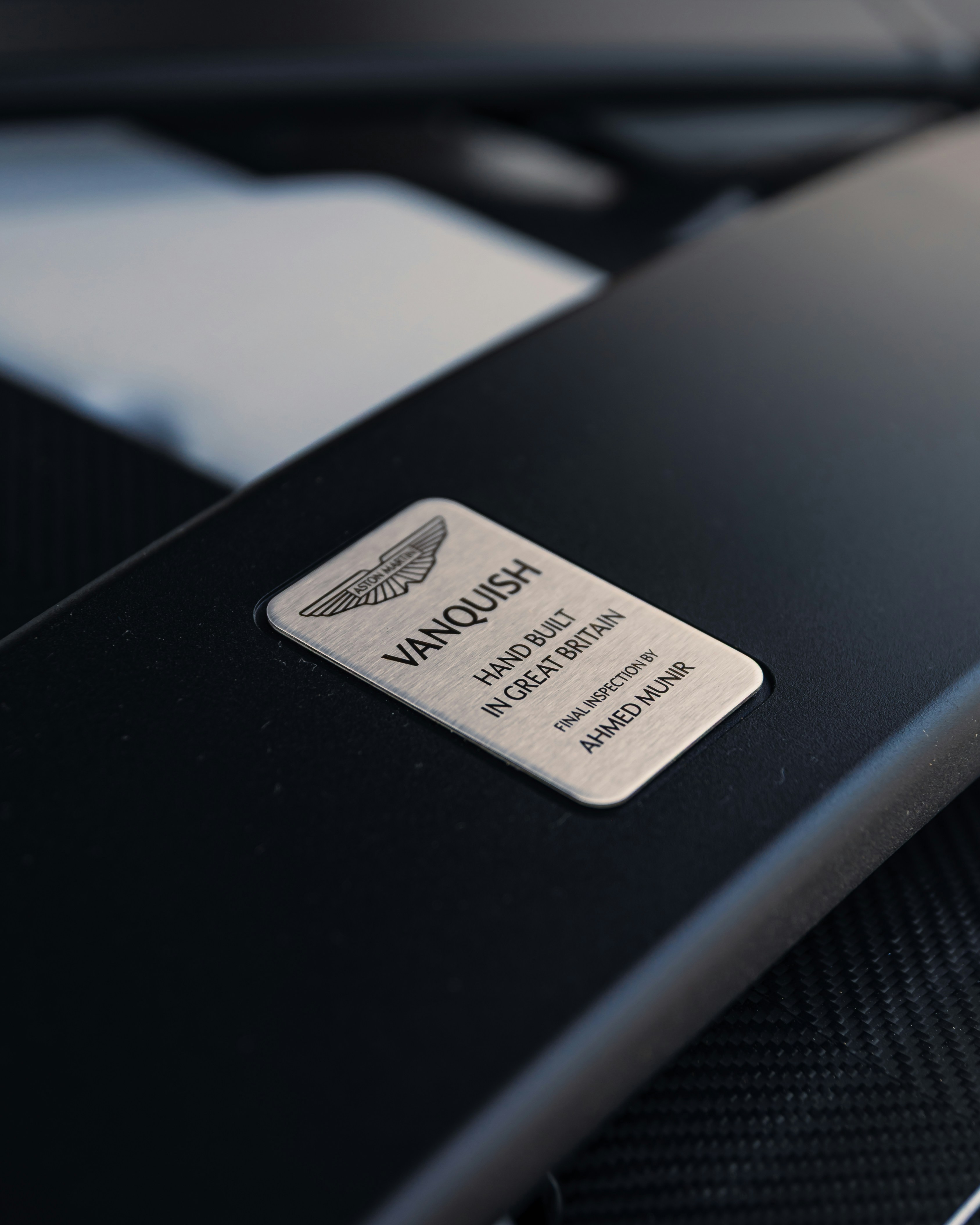 Close-up shows a "vanquish" badge.