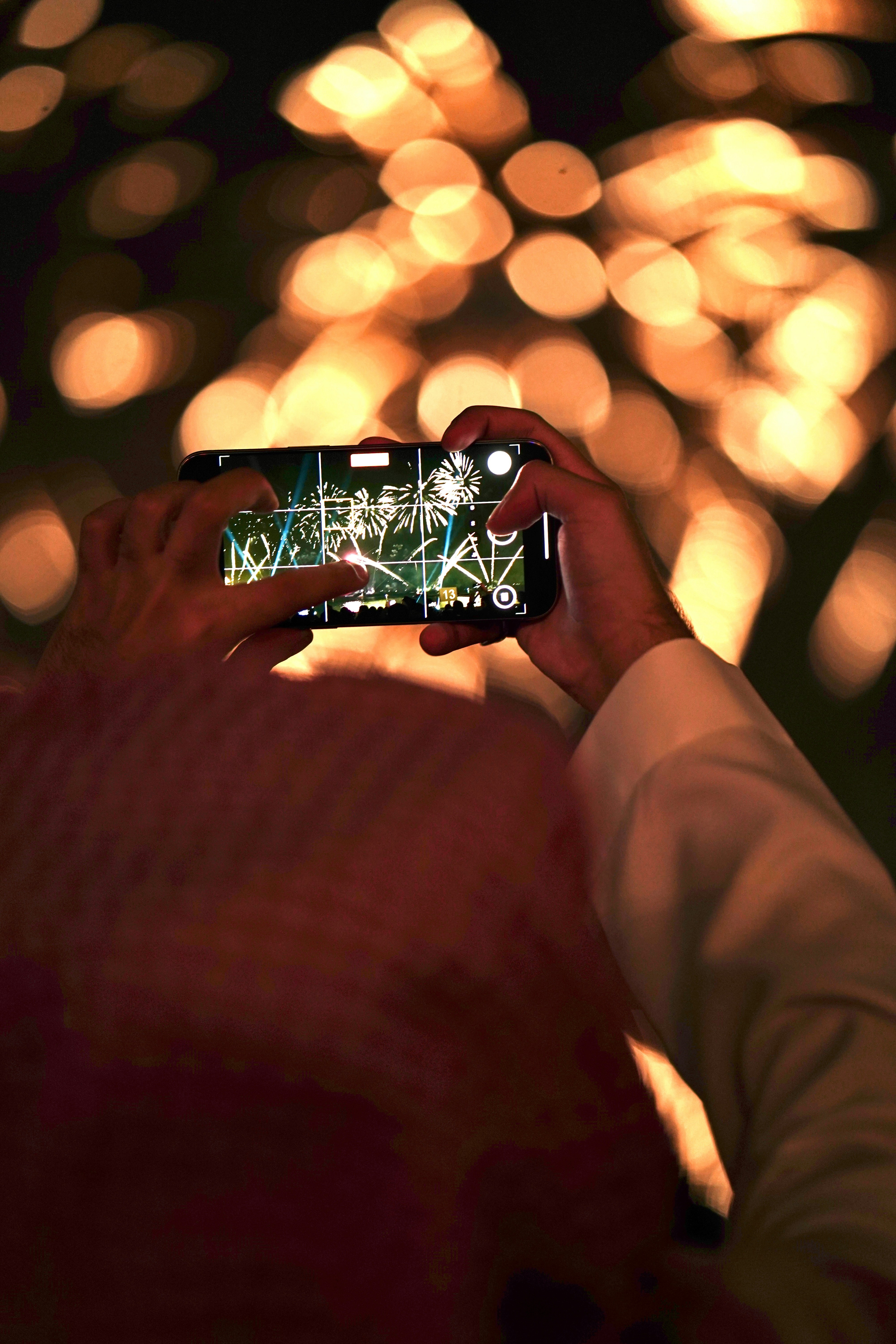 Person is taking a photo with a smartphone
