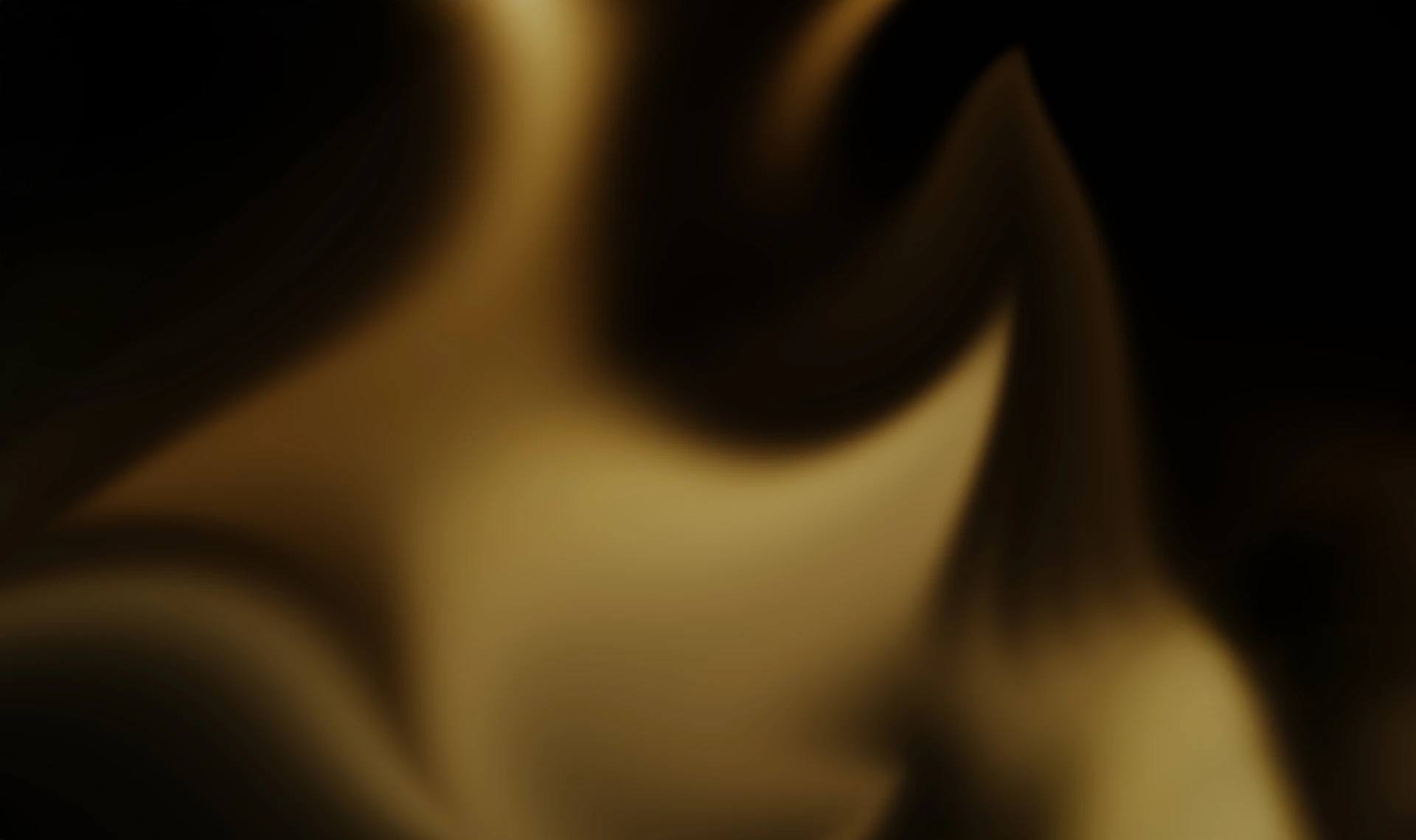 Abstract forms flow in shades of gold.