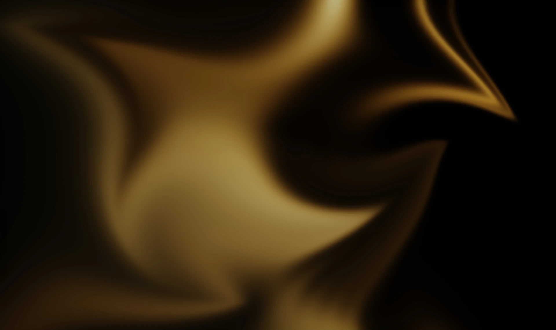 Swirling, golden abstract shape on a black background.