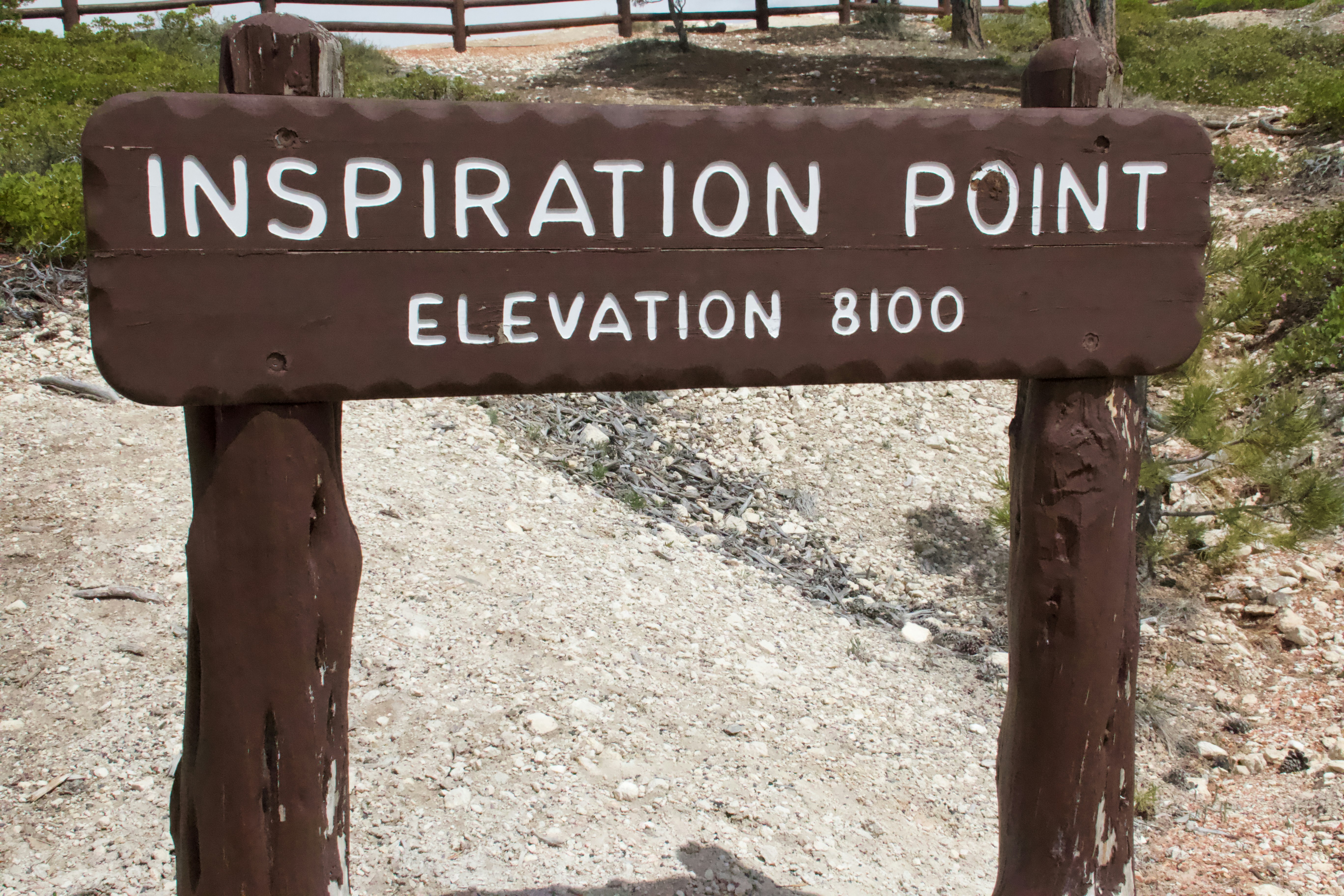 Sign indicates "inspiration point" at 8100 elevation.