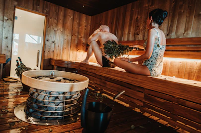 People relax and enjoy a sauna session.