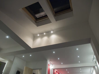 Skylights and recessed lighting in a modern ceiling