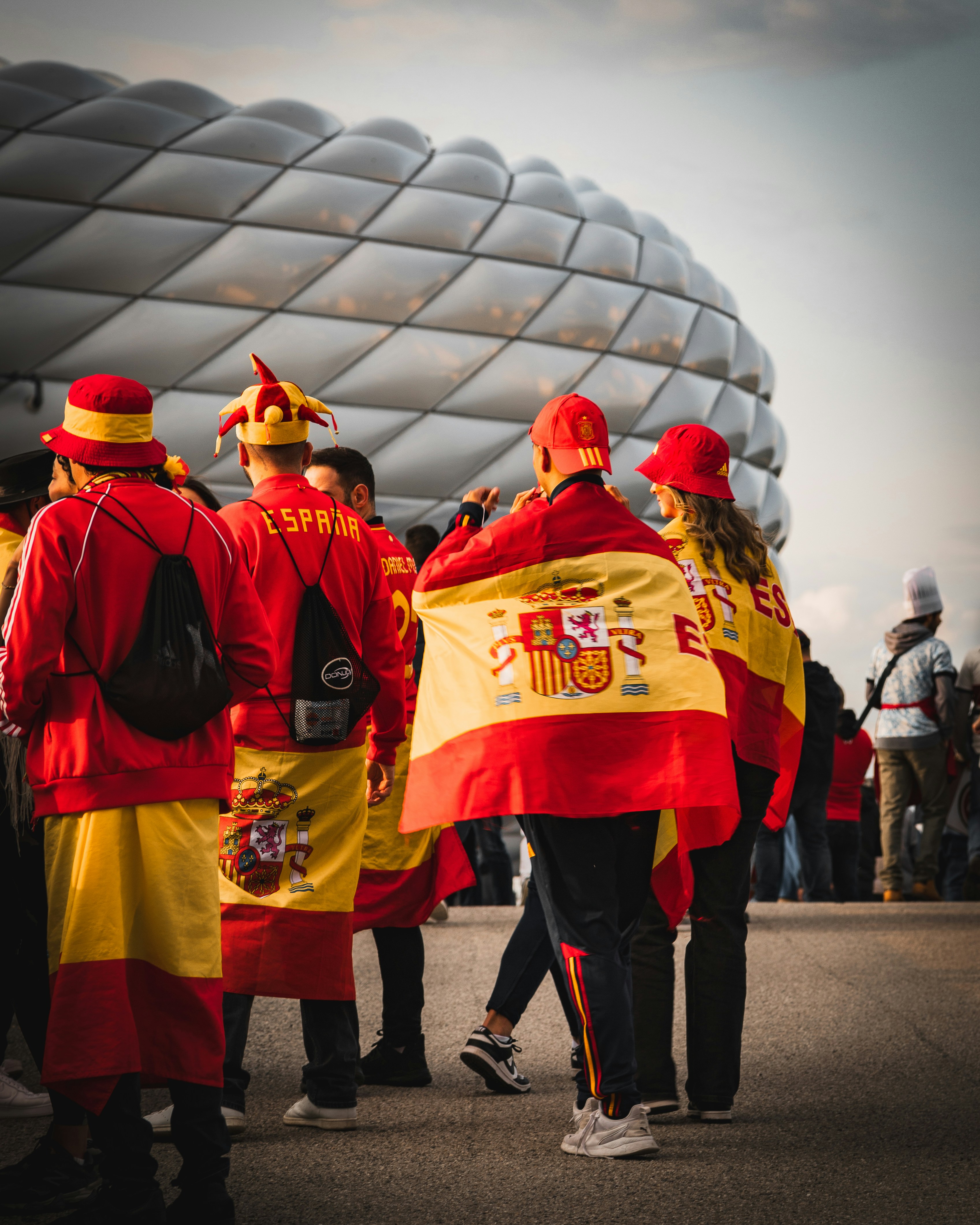 Spanish fans gather at a stadium.