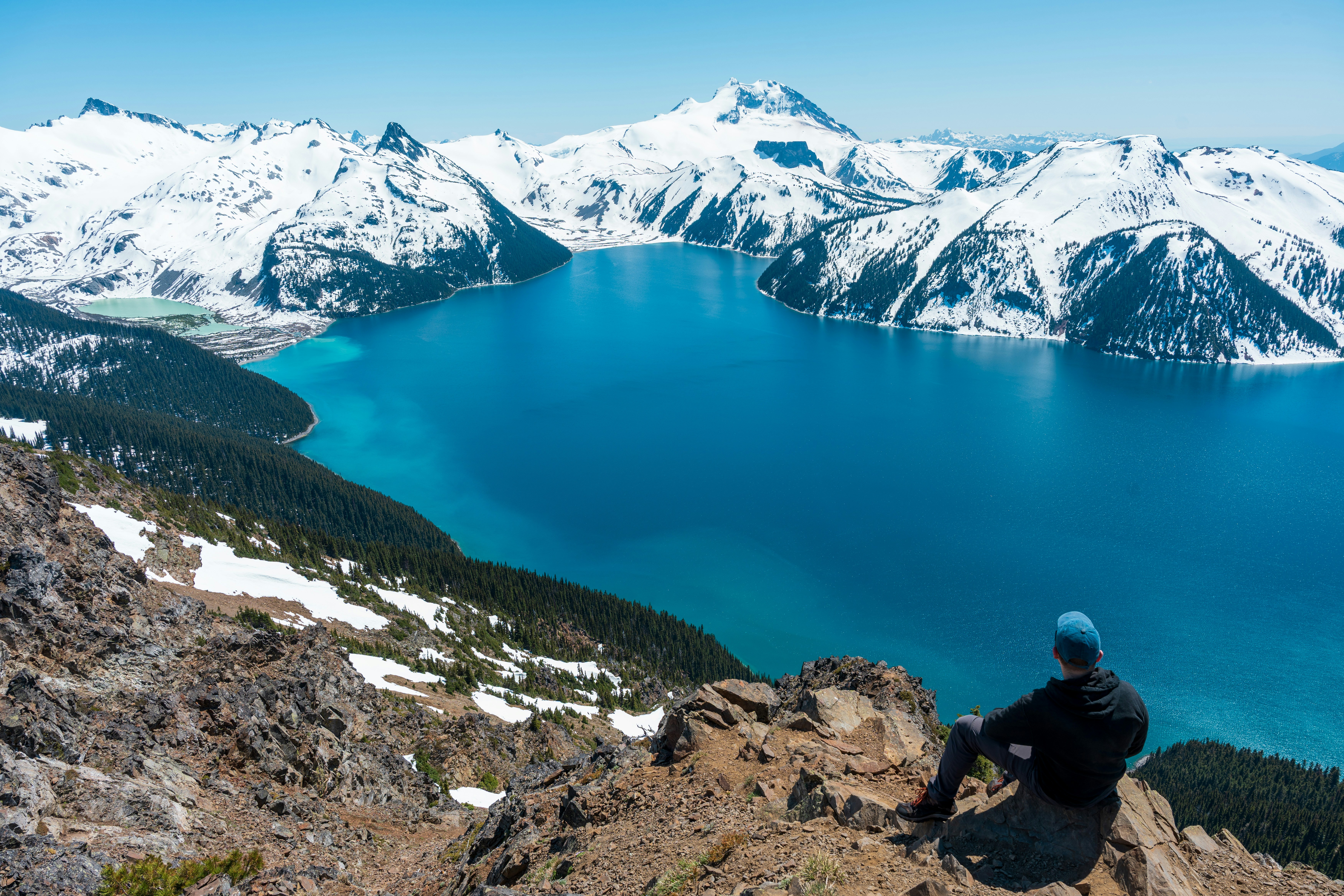 A person enjoys a breathtaking mountain view.
