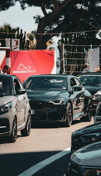 Cars in a line at monaco circuit.