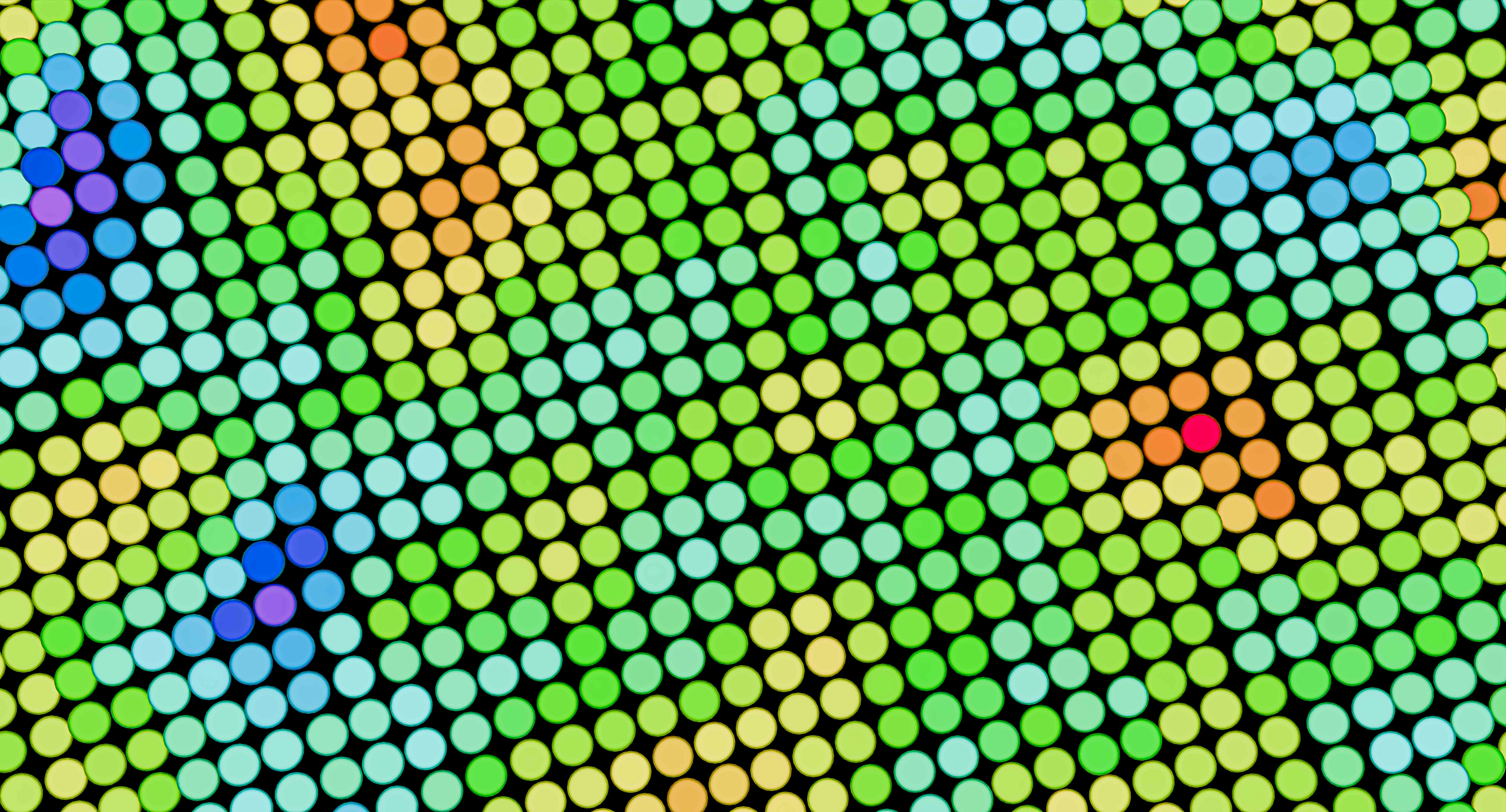 Colorful circles are arranged in a diagonal pattern.