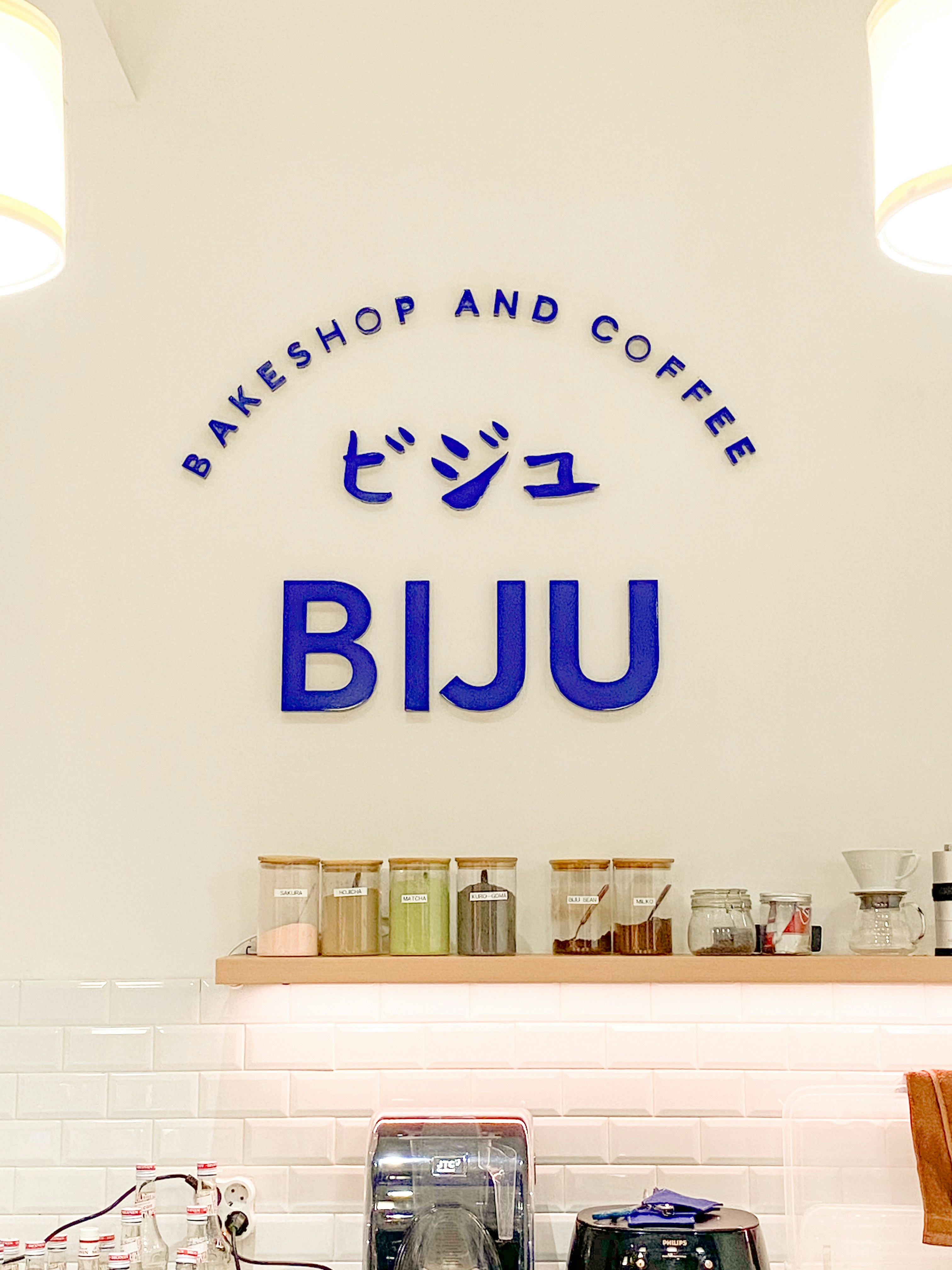 A blue sign for "bakeshop and coffee".