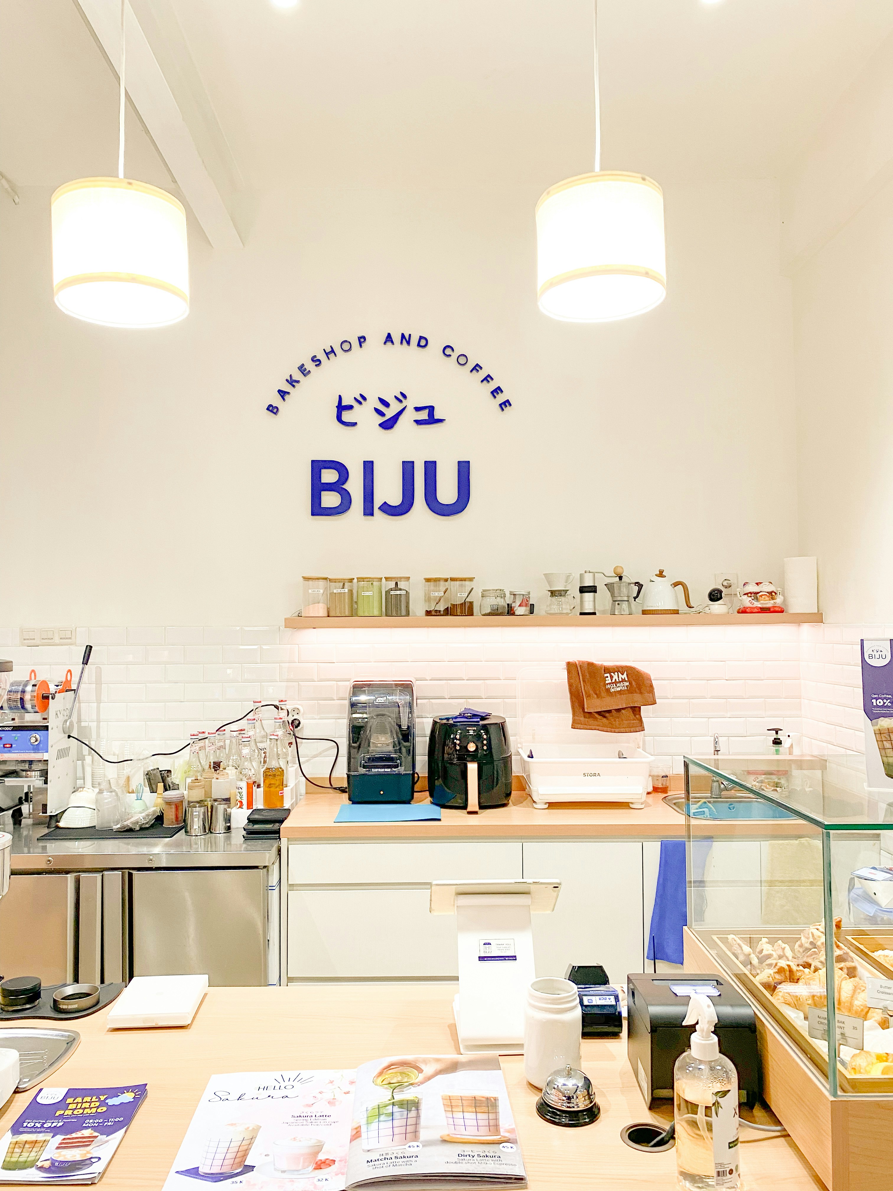 A bakery and coffee shop's interior is shown.
