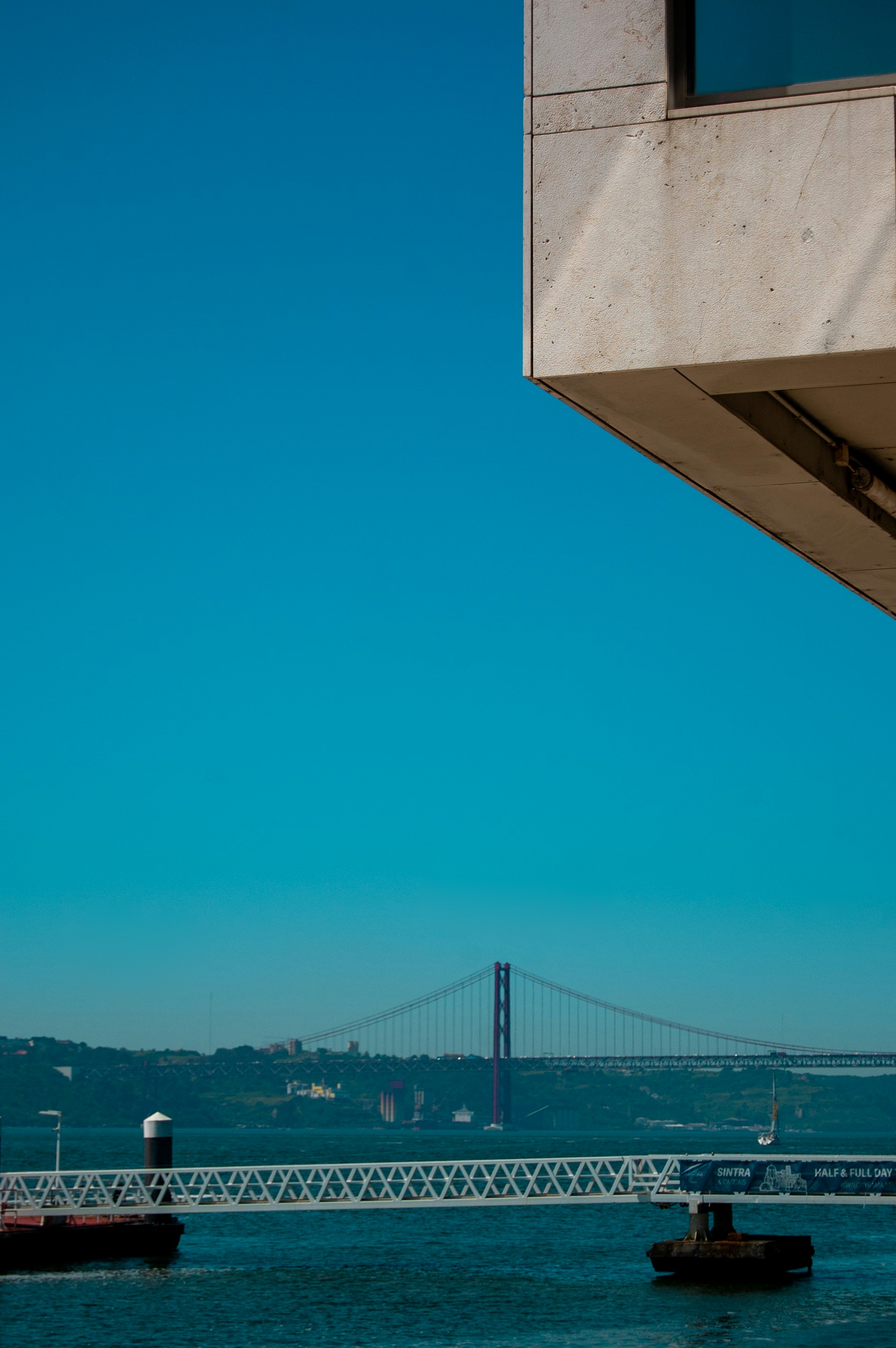 The bridge stands against the blue sky.