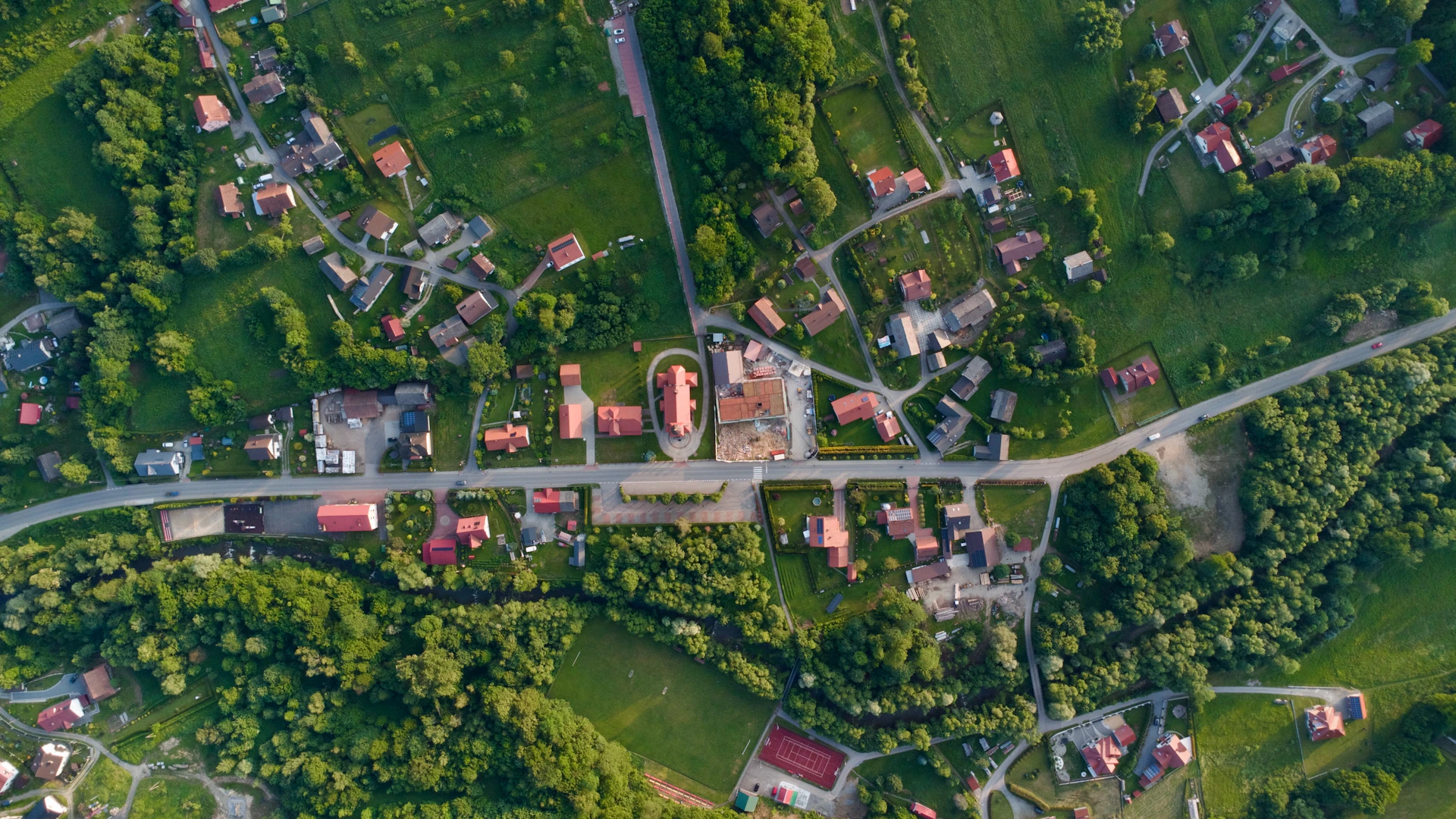 Aerial view of a small village in the countryside.