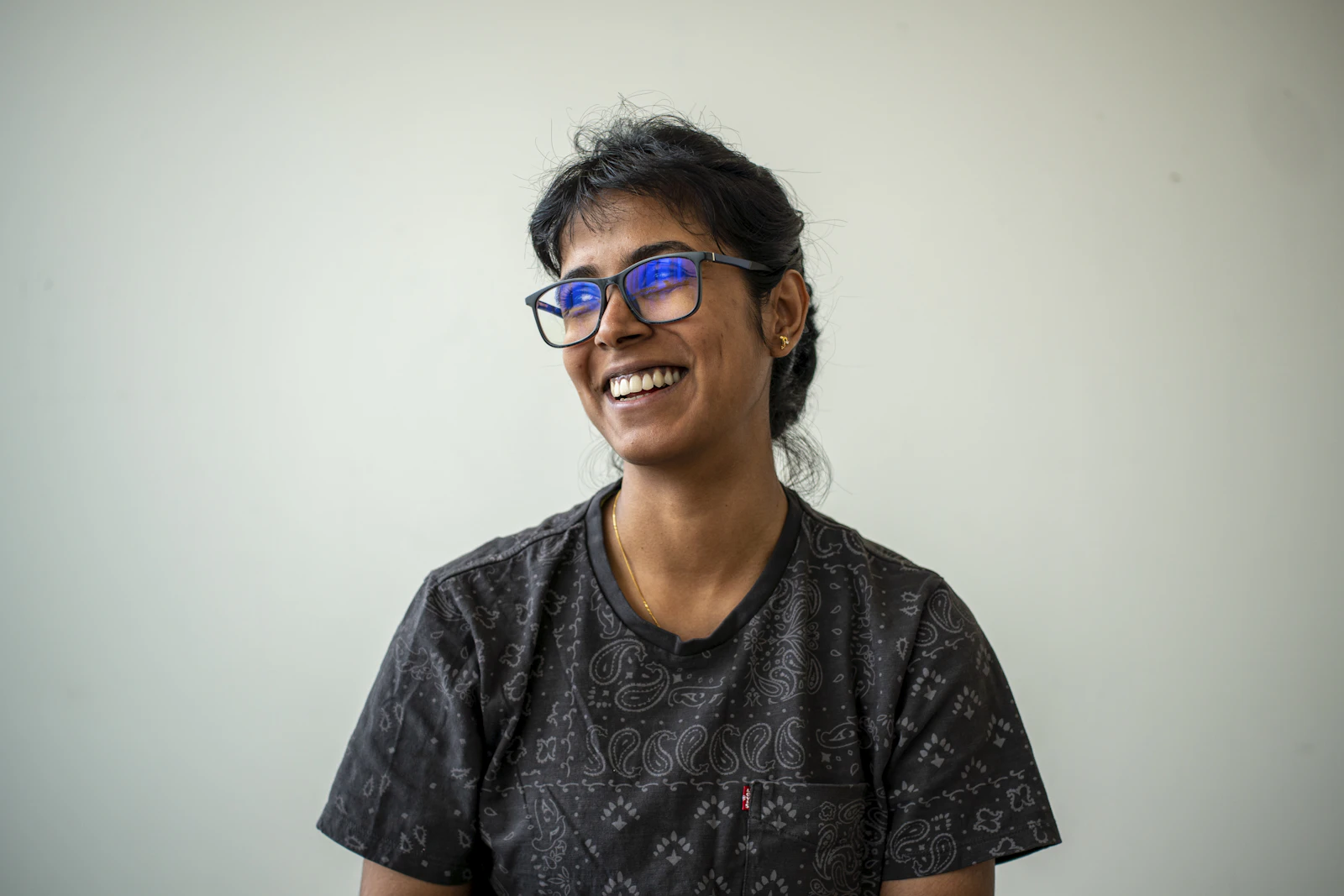 Meera Sharma, trained patient care attendant, smiling