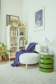 Cozy reading corner with armchair and bookshelf