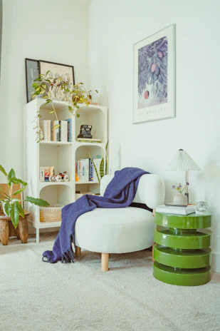 Cozy reading corner with armchair and bookshelf