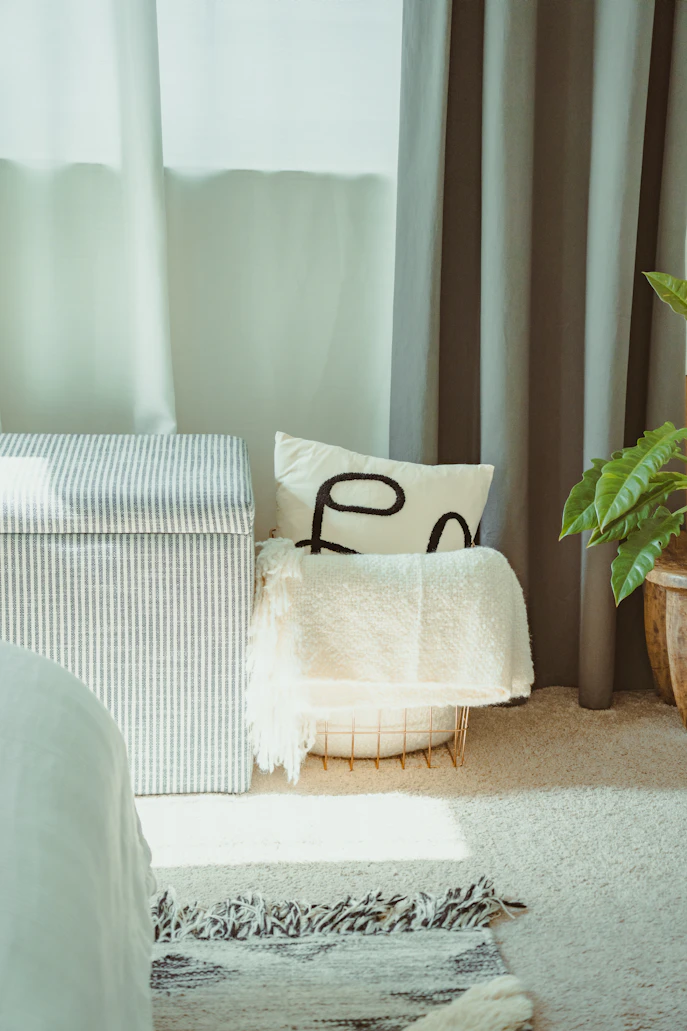 Folded Linen Blanket in Organized Bedroom Home Decor 2026