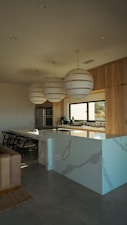 Modern kitchen with pendant lights
