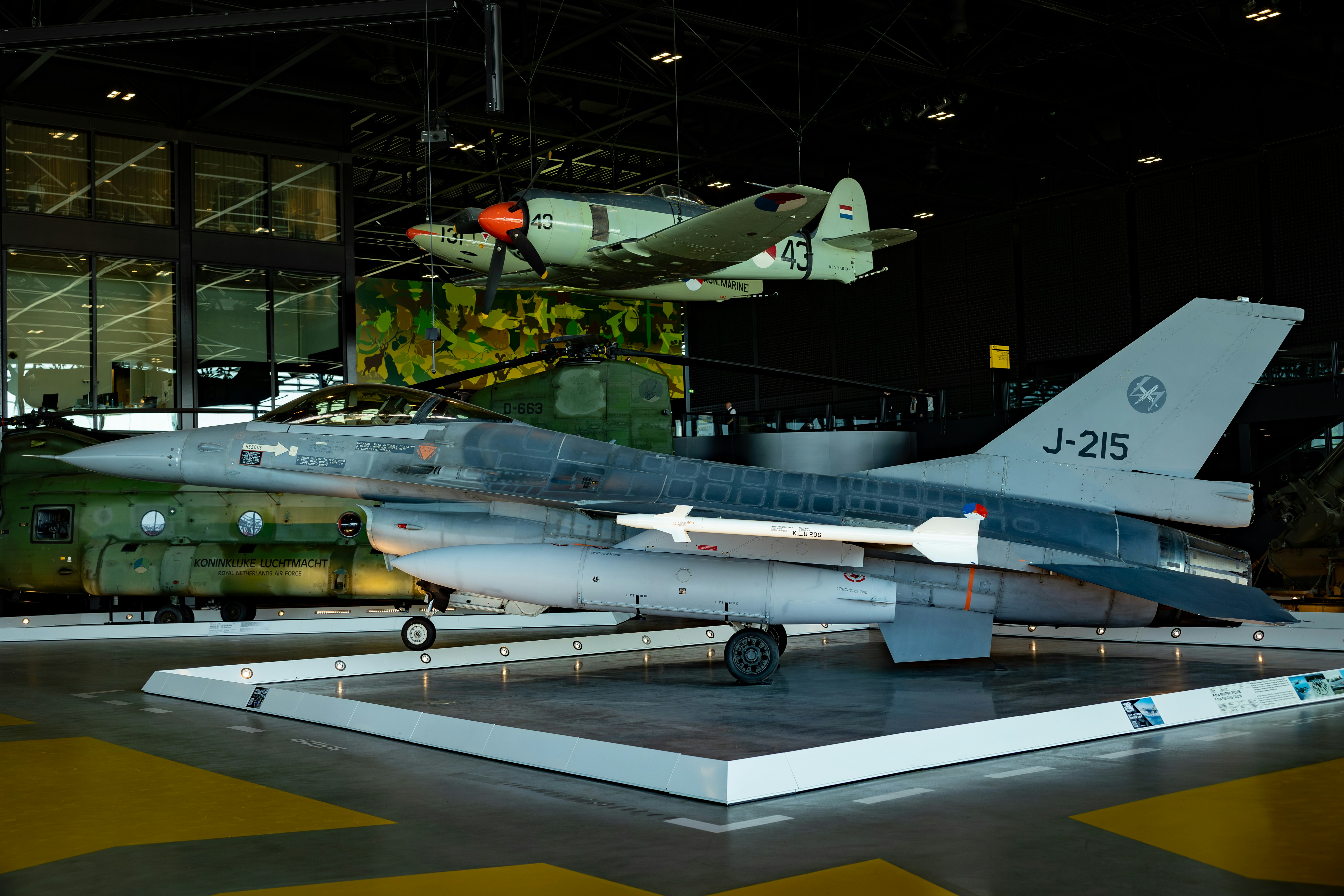 A fighter jet is displayed in a museum.