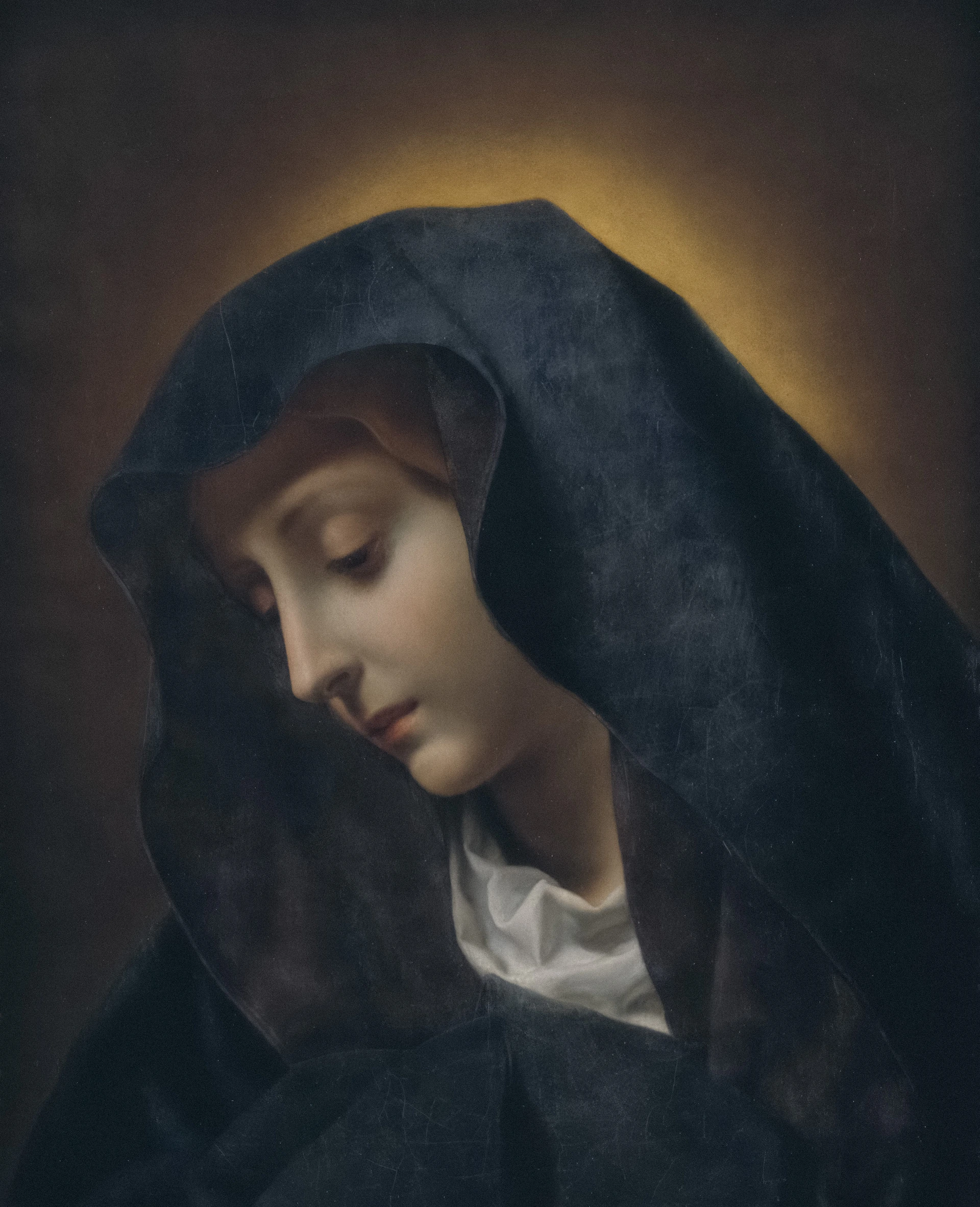 A painting of a woman with a dark veil.