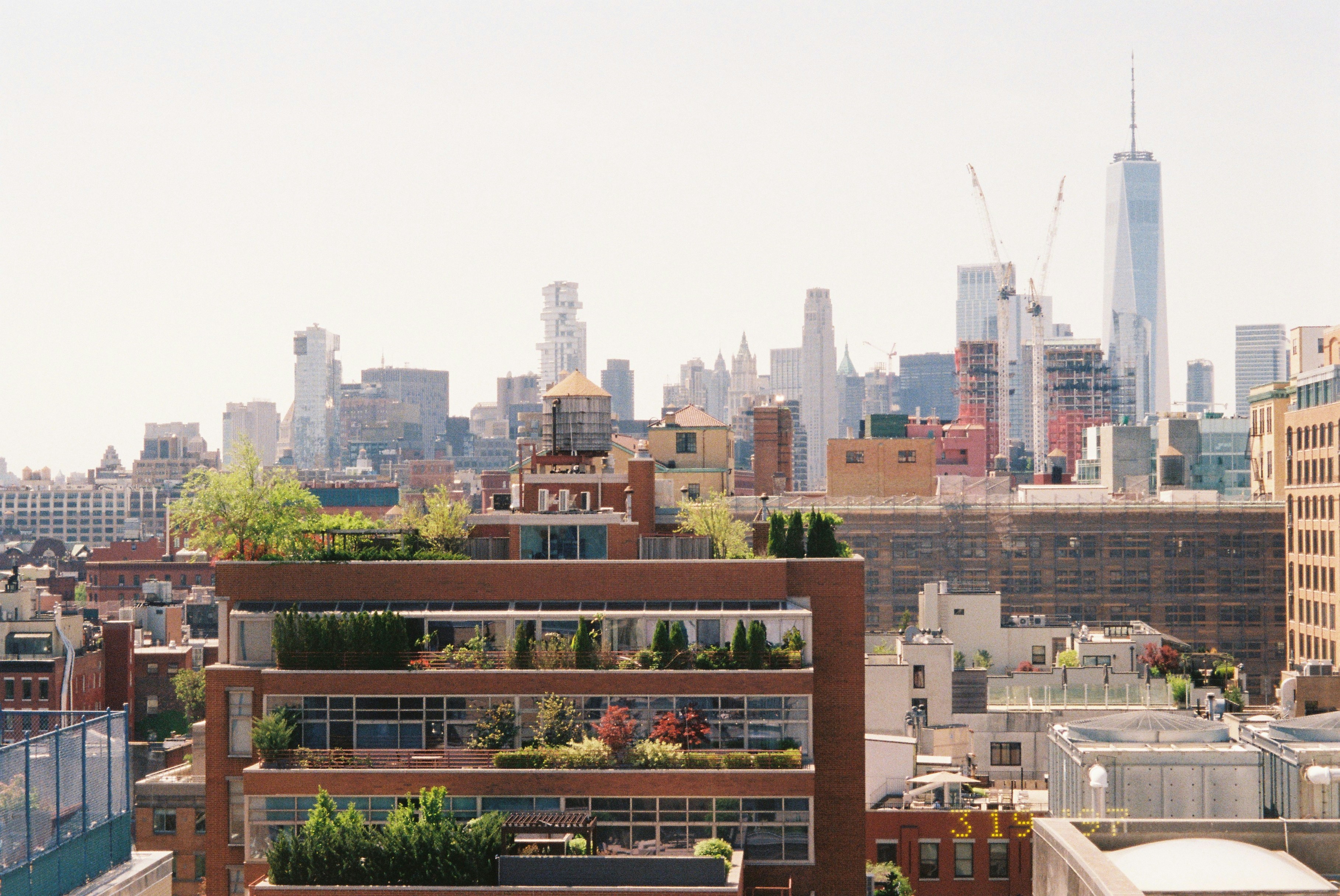 A new york city skyline view on a sunny day.