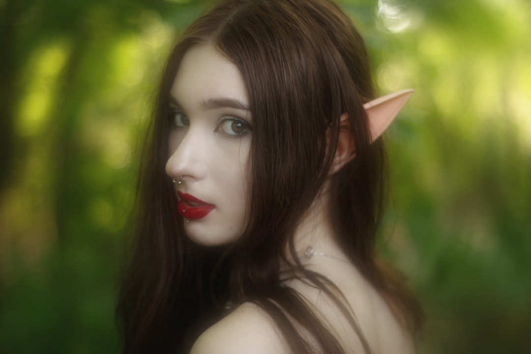 A woman cosplaying as a forest elf.,