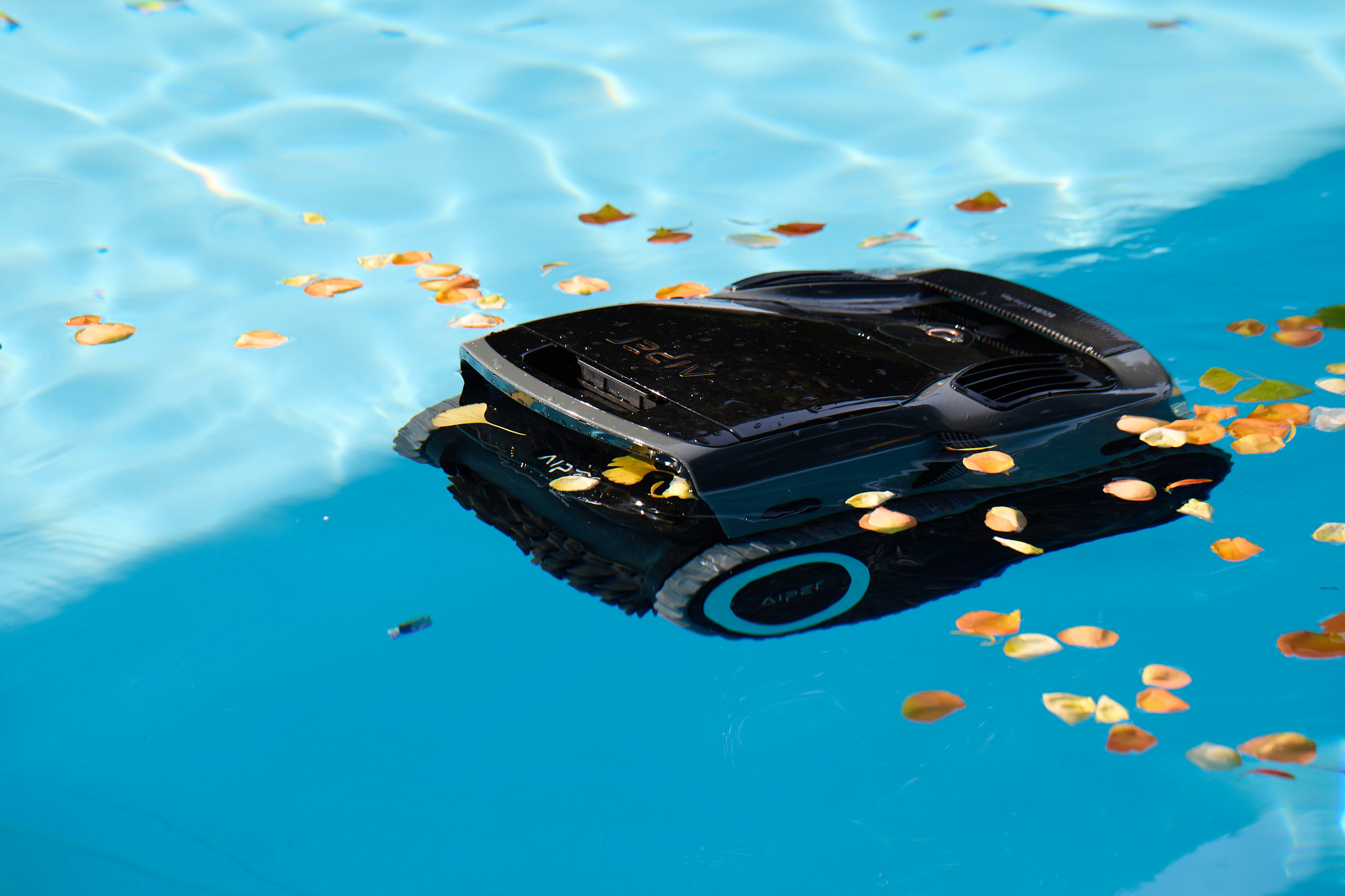 A robotic pool cleaner in water.