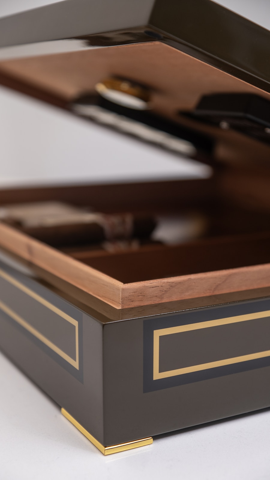 Daniel Marshall humidor open on a leather-topped desk