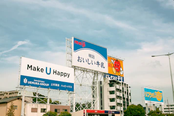 Billboard signs with japanese writing are visible.
