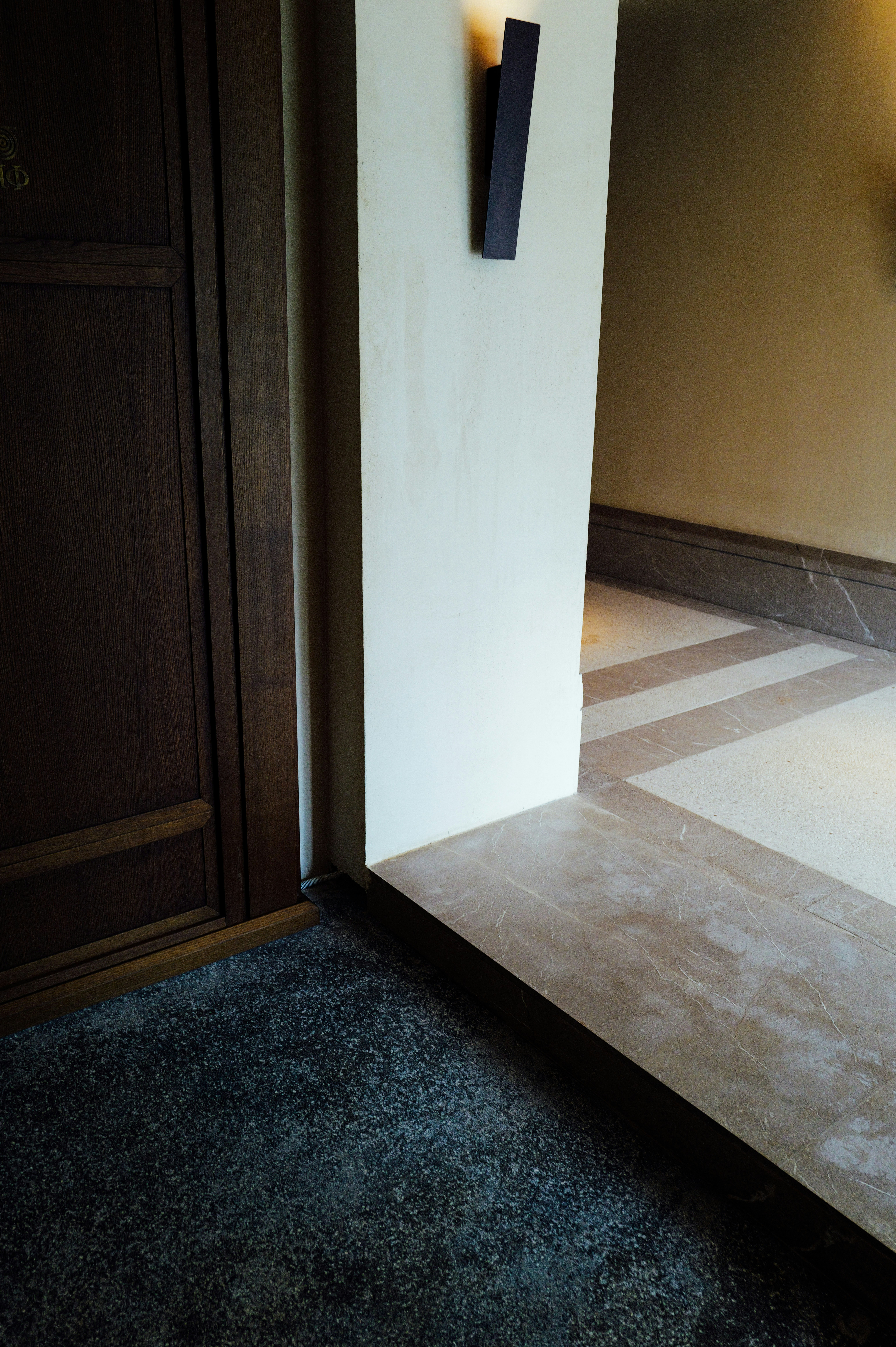 Doorway and floor in a modern building.