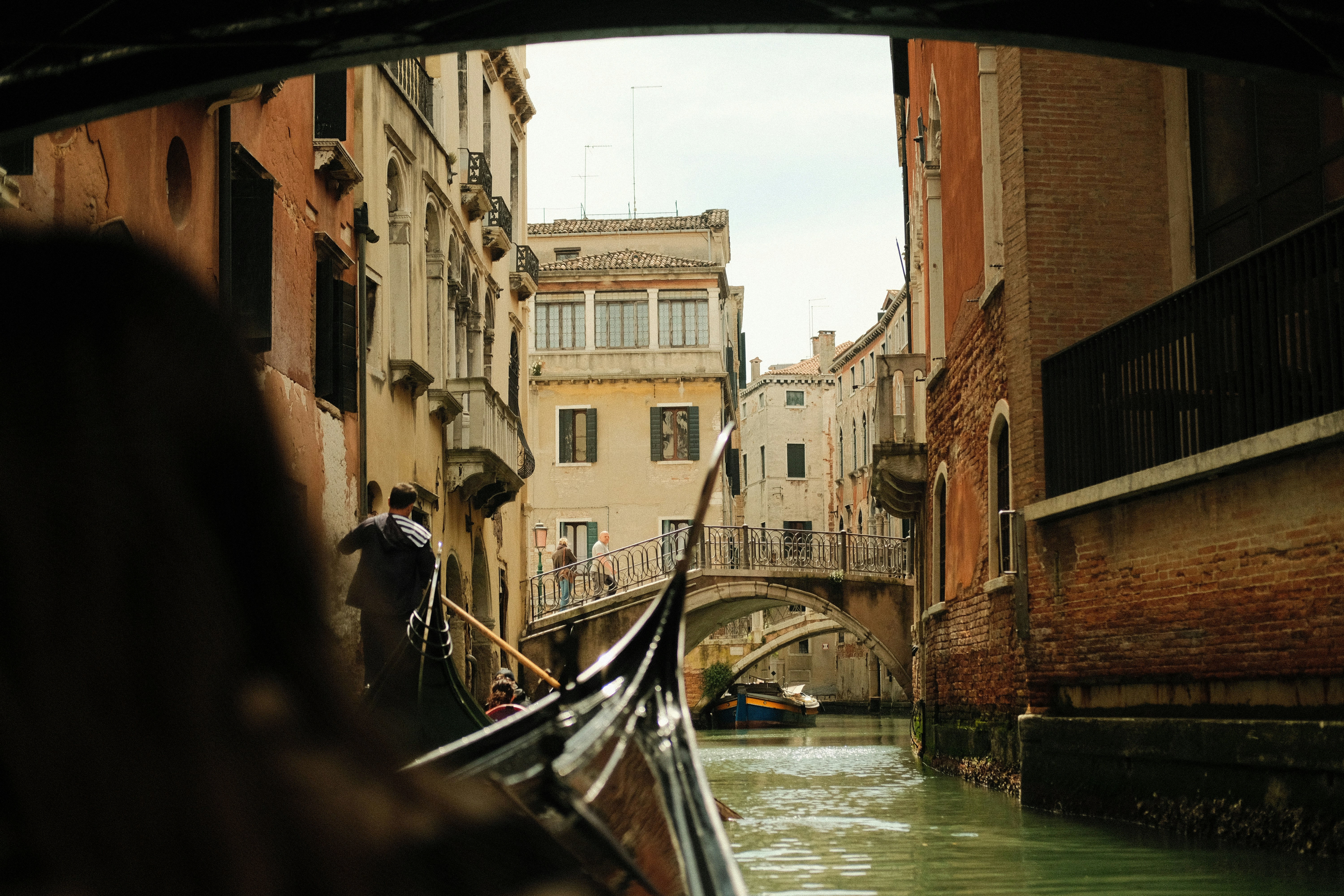 A gondola glides through venice's canals.