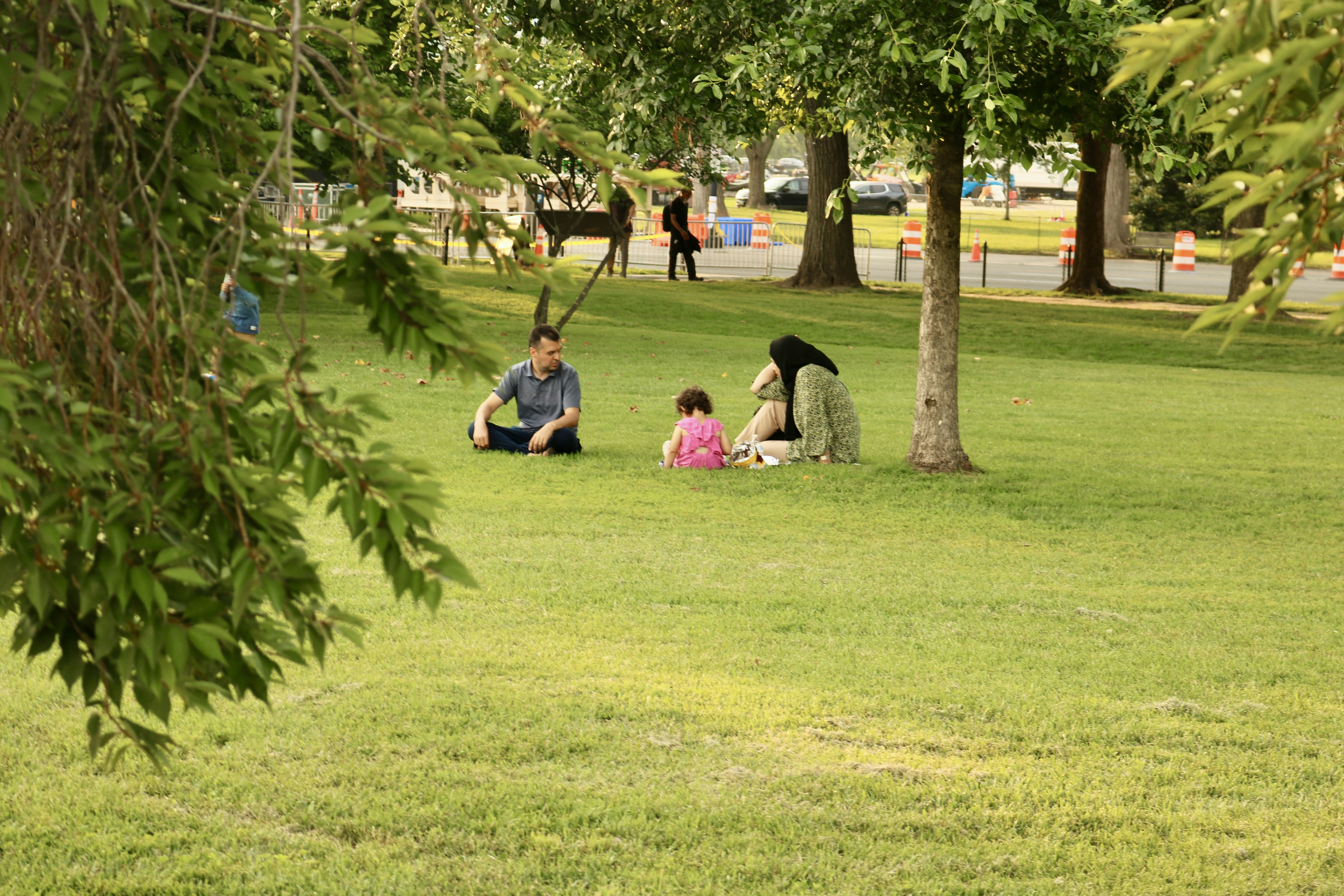 family enjoying weekend outdoors in Denver park - recurring cleaning service denver