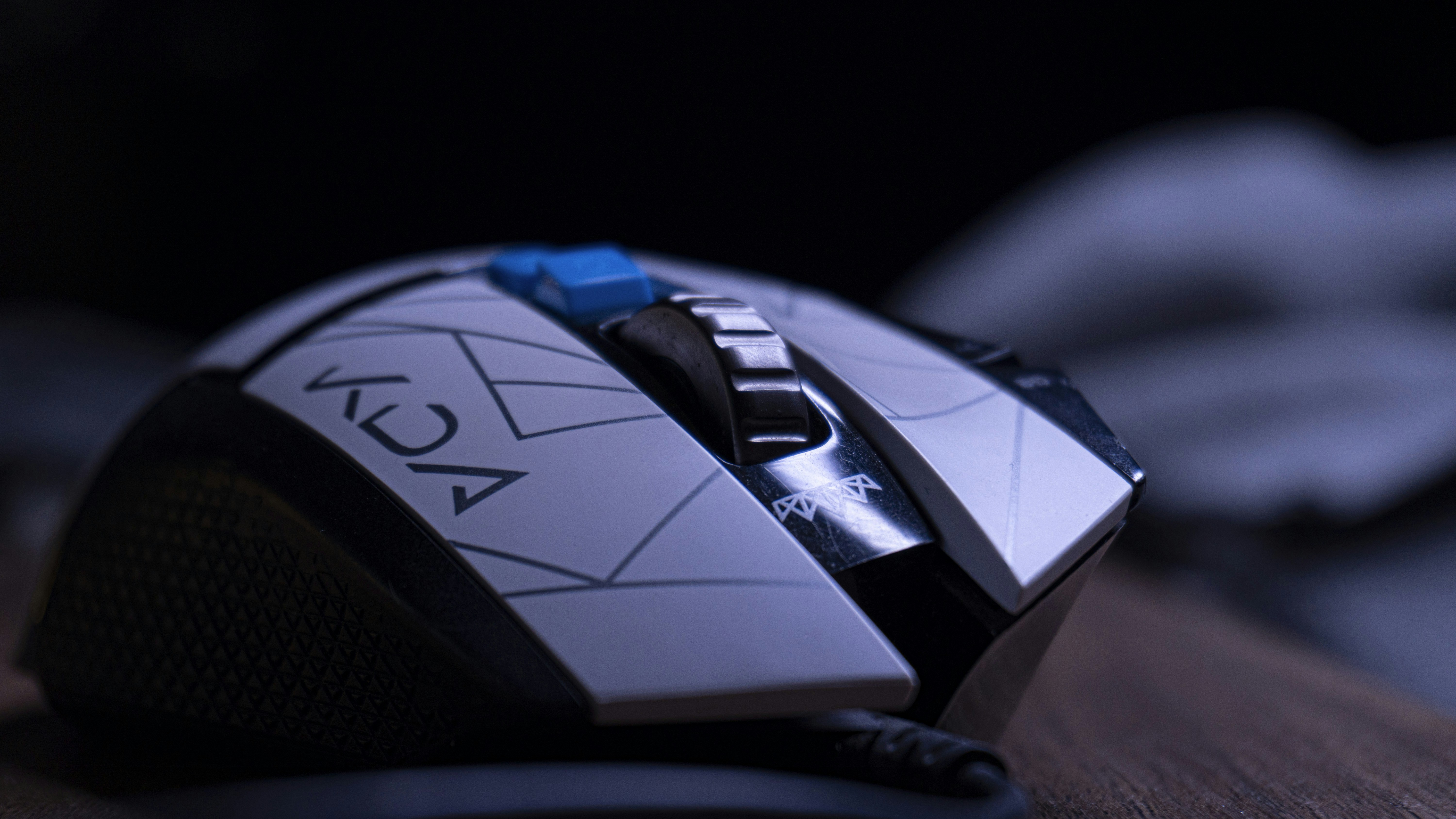 A futuristic mouse rests on a surface.